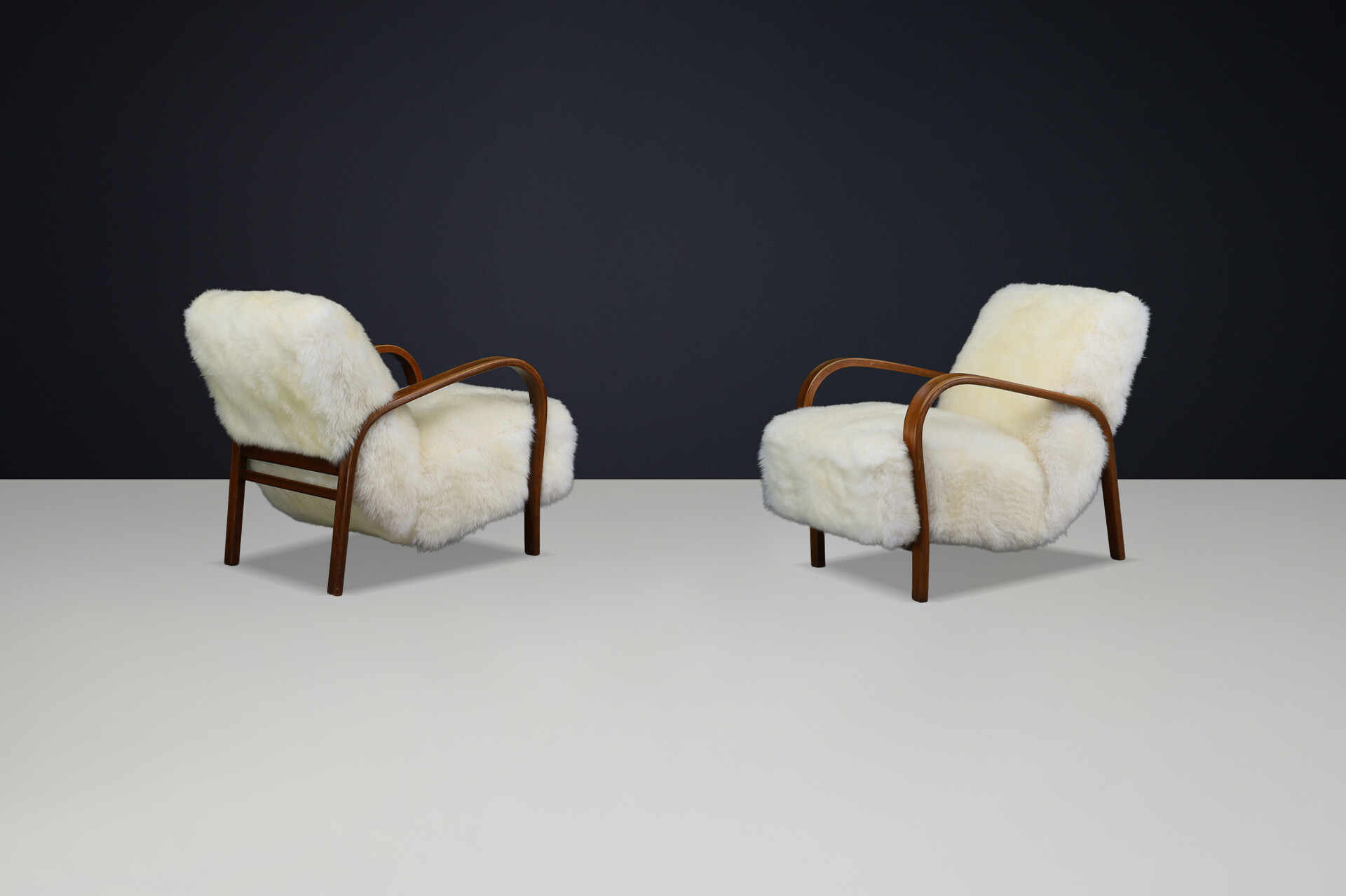 1940s Kozelka & Kropacek Armchairs in Sheepskin & Patinated Frame Mid-20th century