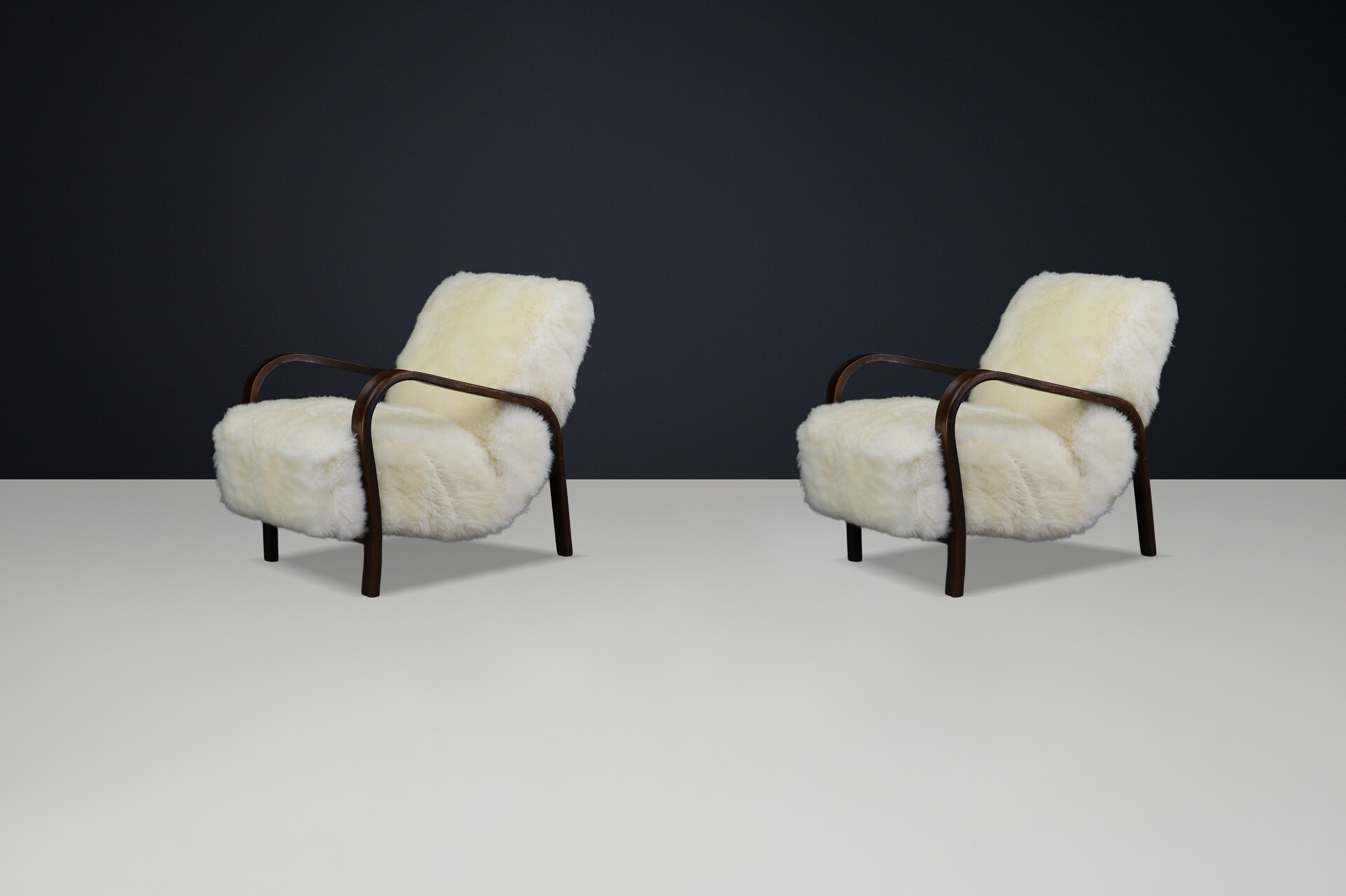 1940s Kozelka & Kropacek Armchairs in Sheepskin & Patinated Frame Mid-20th century