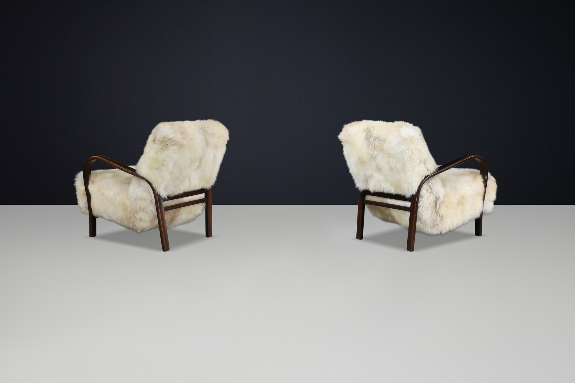 1940s Kozelka & Kropacek Armchairs in Texel Sheepskin & Dark Patinated Frame Mid-20th century