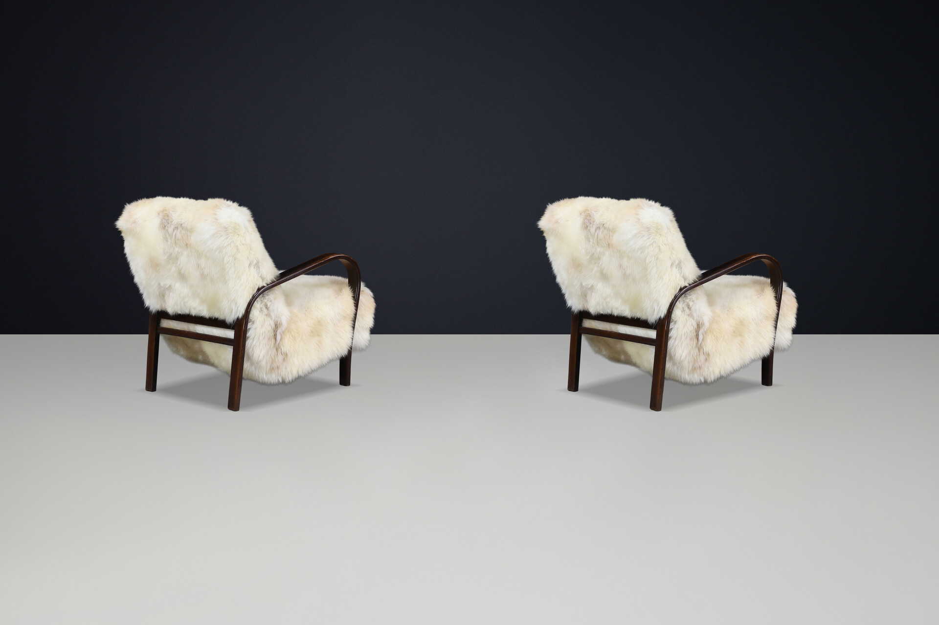 1940s Kozelka & Kropacek Armchairs in Texel Sheepskin & Dark Patinated Frame Mid-20th century