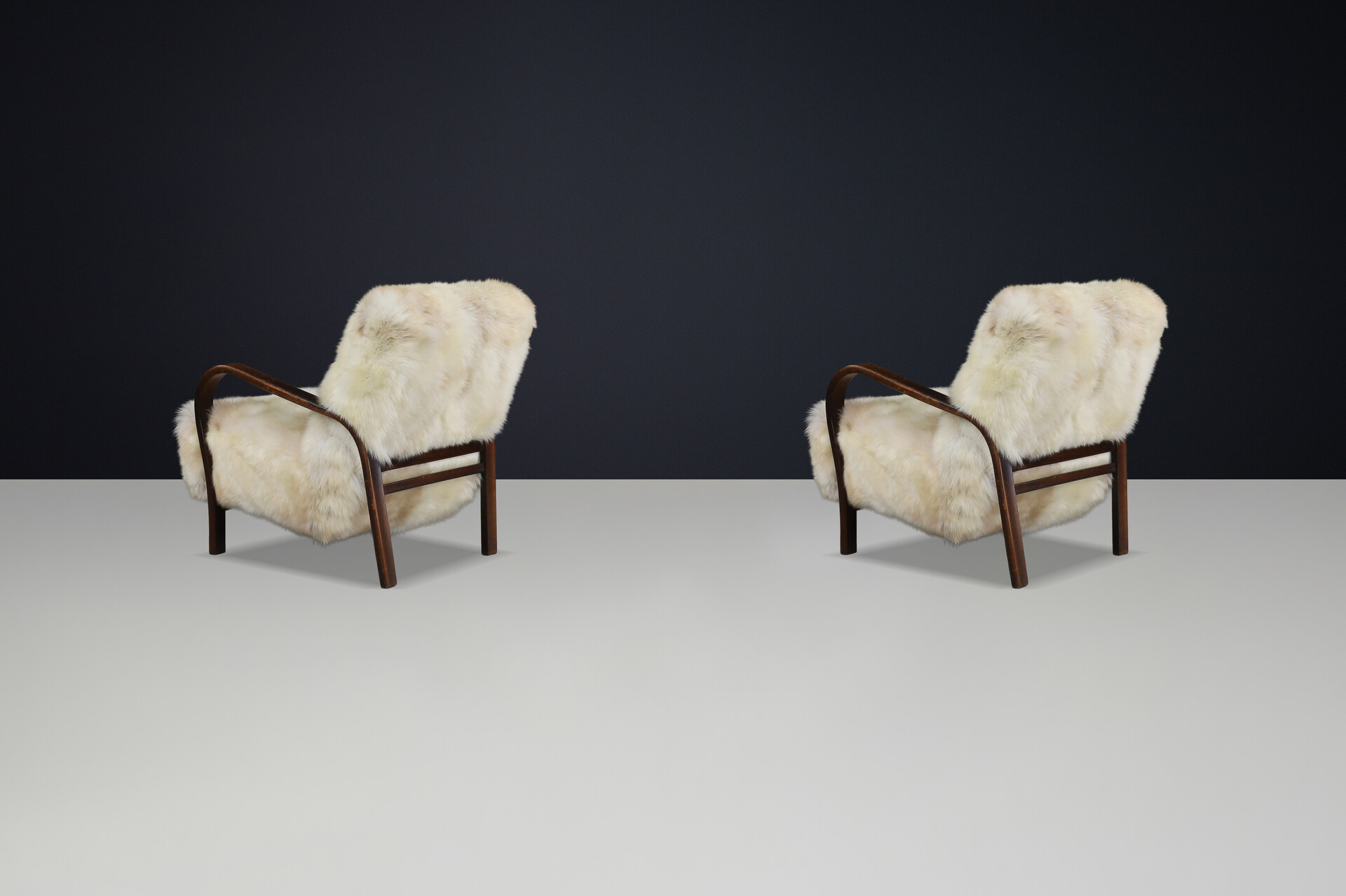 1940s Kozelka & Kropacek Armchairs in Texel Sheepskin & Dark Patinated Frame Mid-20th century
