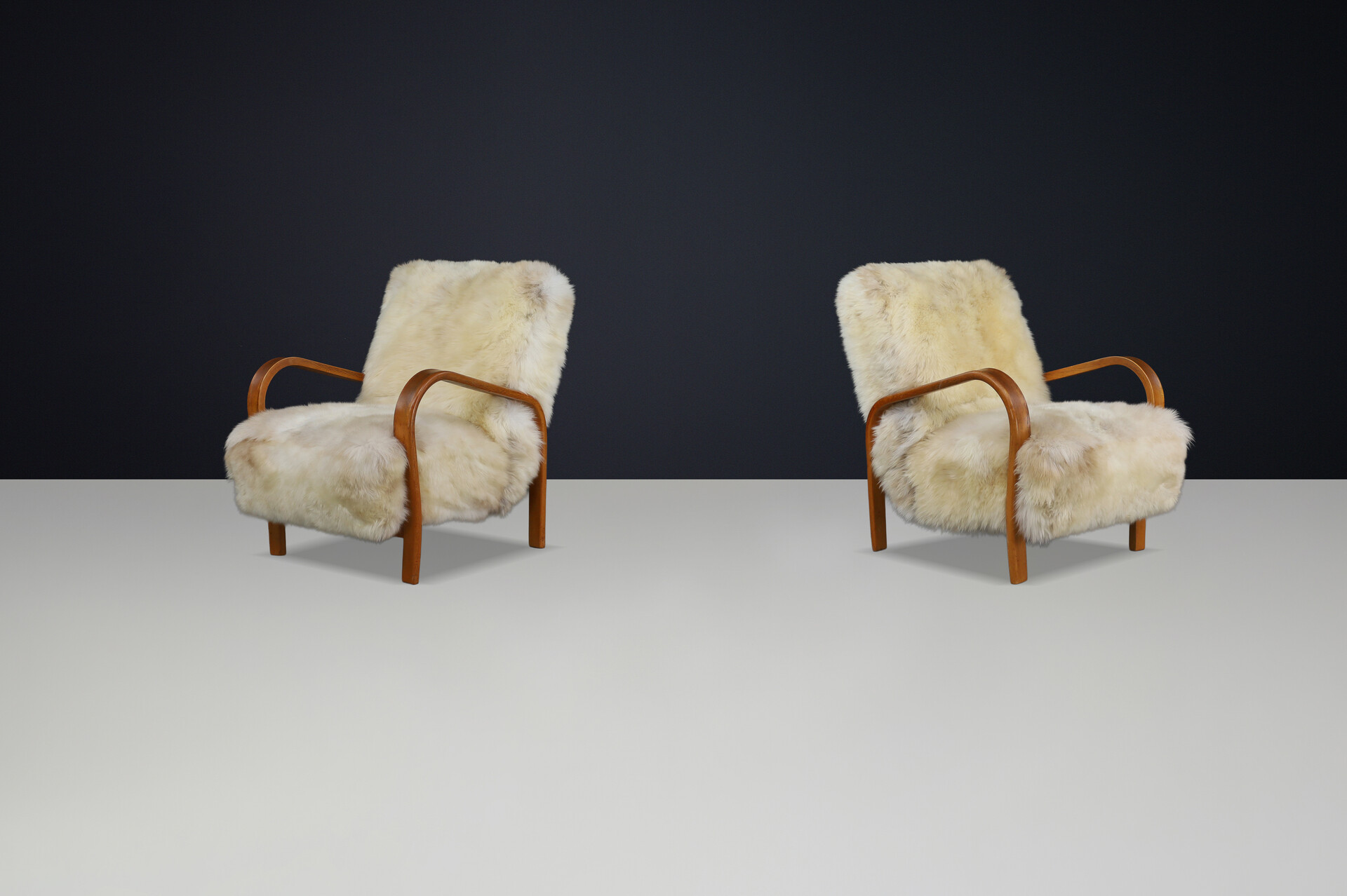 1940s Kozelka & Kropacek Armchairs in Texel Sheepskin & Patinated Frame Mid-20th century