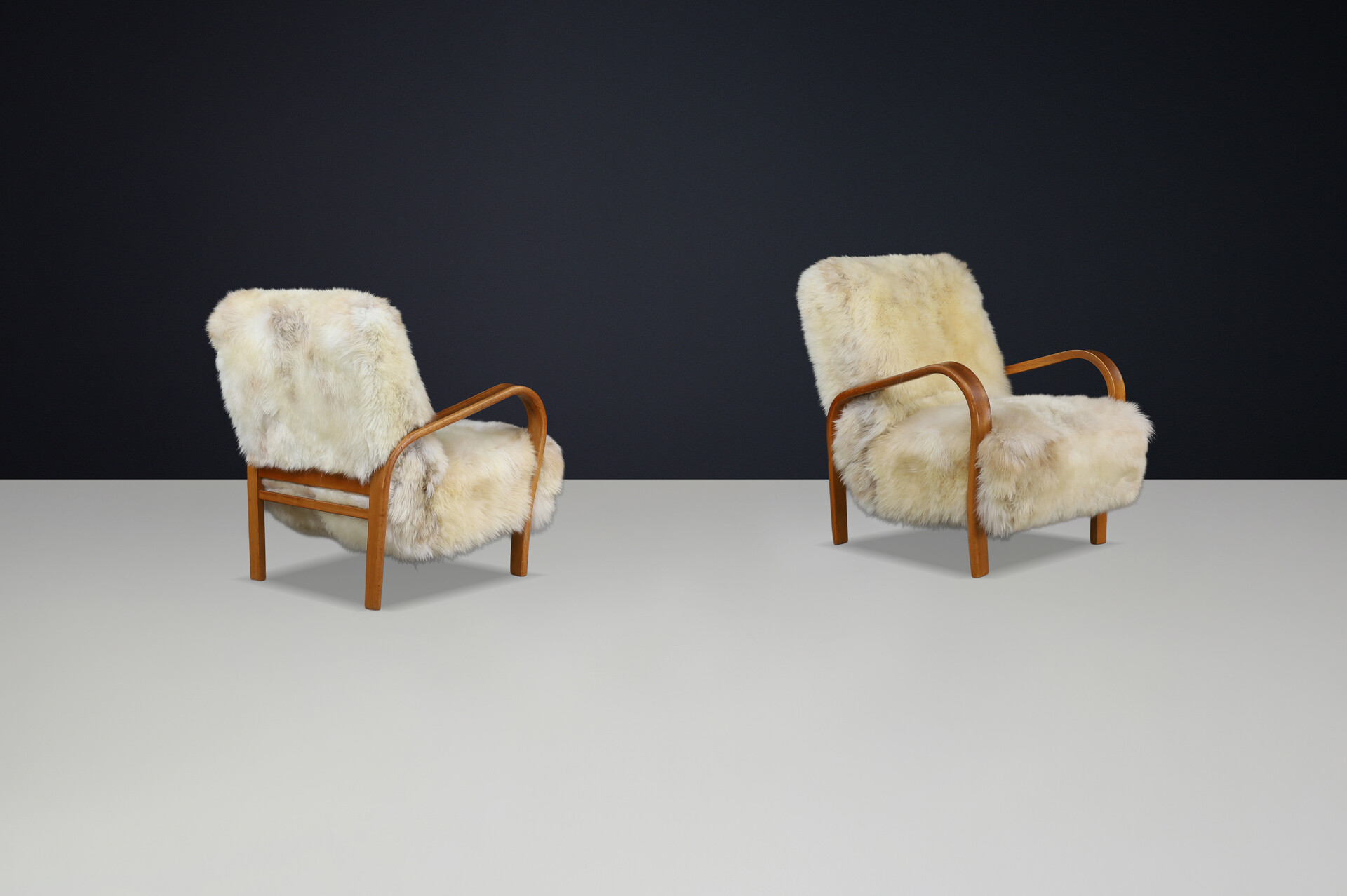 1940s Kozelka & Kropacek Armchairs in Texel Sheepskin & Patinated Frame Mid-20th century