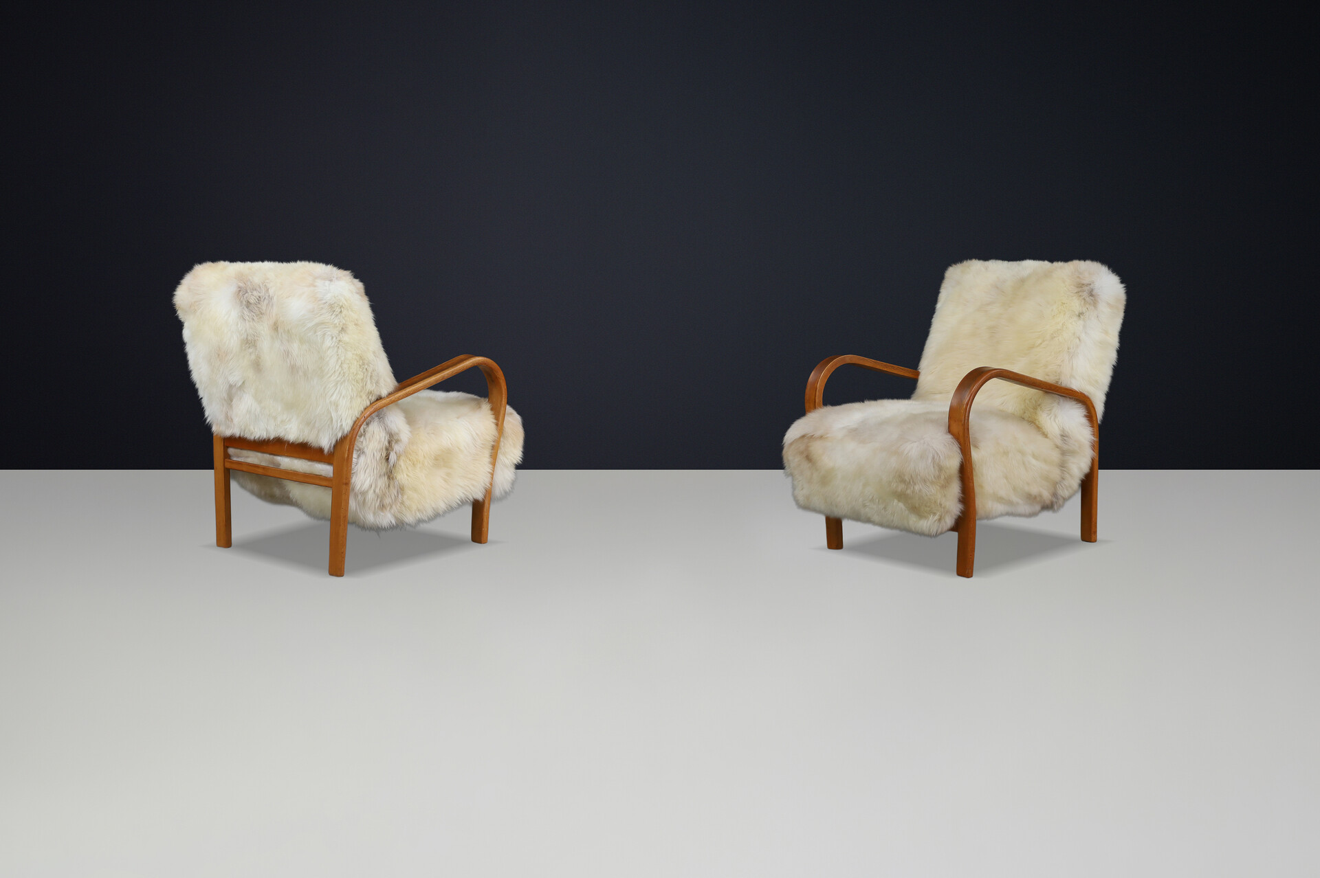 1940s Kozelka & Kropacek Armchairs in Texel Sheepskin & Patinated Frame Mid-20th century