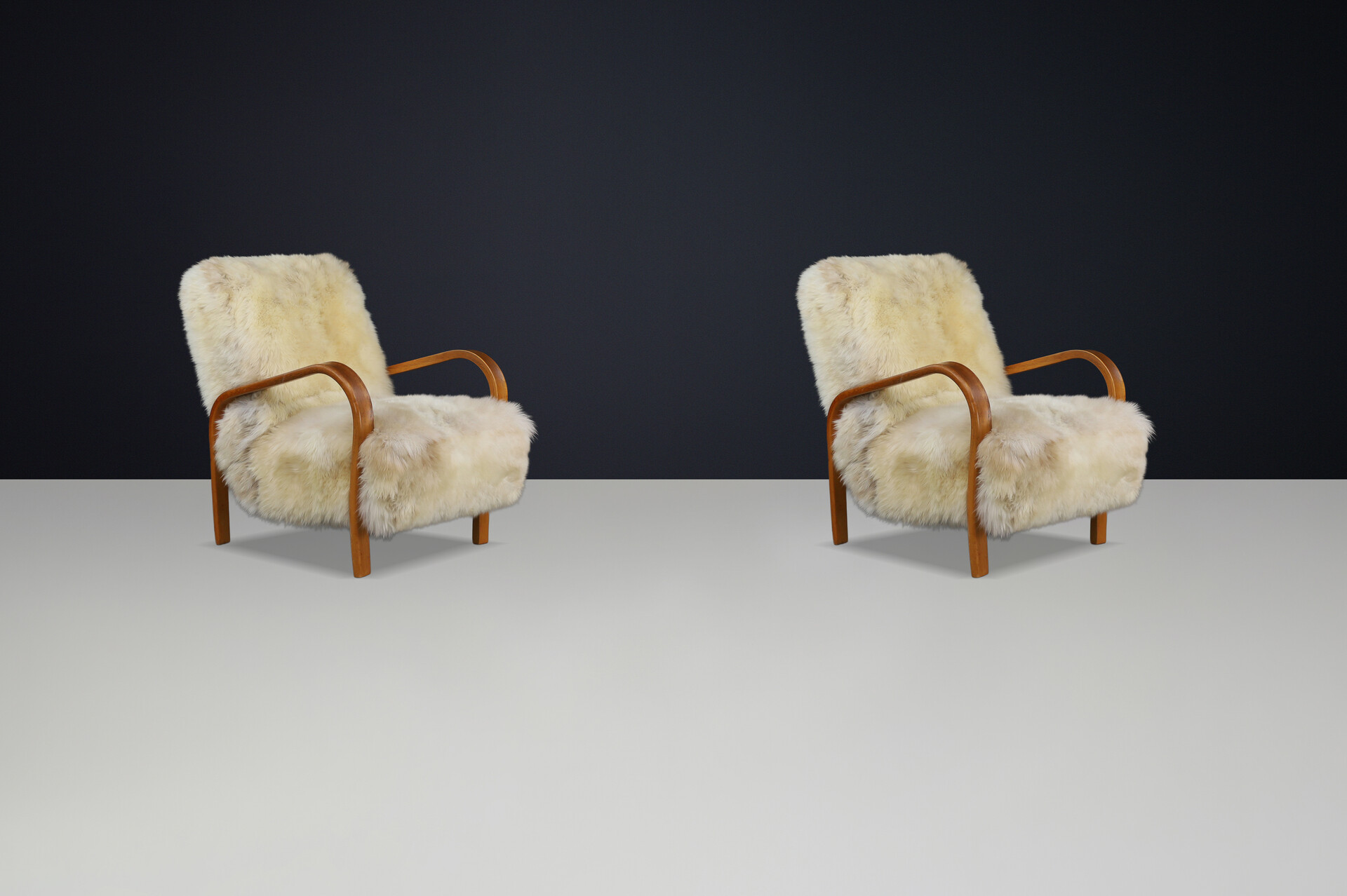 1940s Kozelka & Kropacek Armchairs in Texel Sheepskin & Patinated Frame Mid-20th century