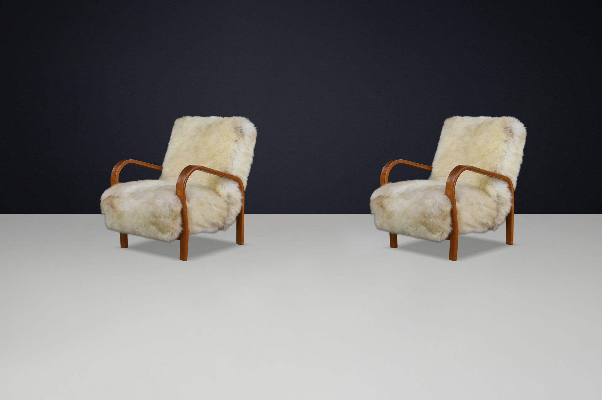 1940s Kozelka & Kropacek Armchairs in Texel Sheepskin & Patinated Frame Mid-20th century