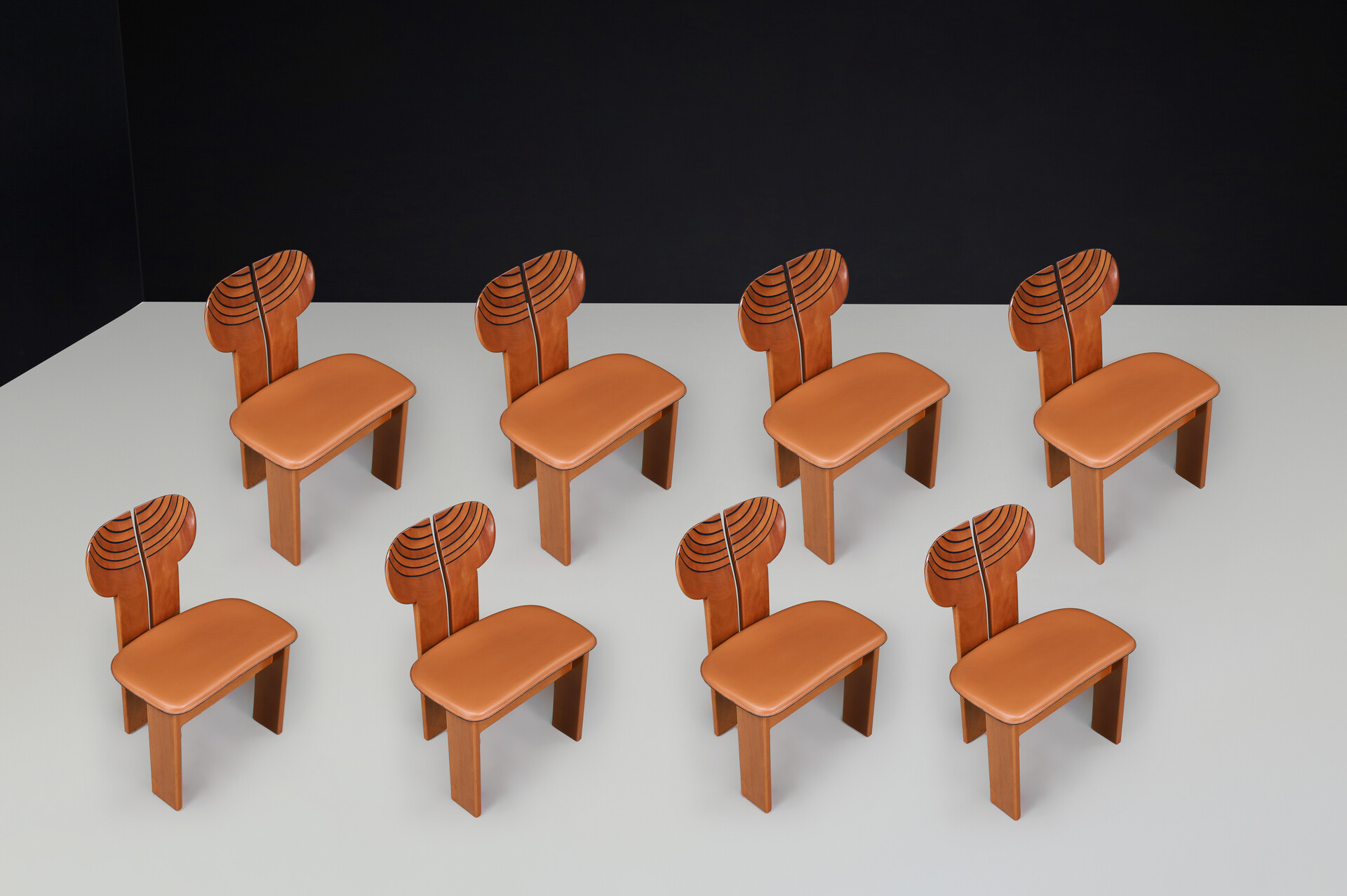 Afra & Tobia Scarpa for Maxalto Set of eight 'Africa' DiningChairs in Walnut, cognac brown Leather and Brass Italy 1975. Late-20th century
