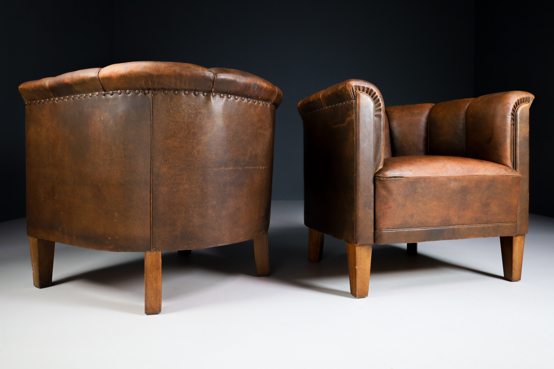 Art-Deco Arm Chairs / lounge chairs / Club chair in Patinated leather , Austria 1920s Early-20th century