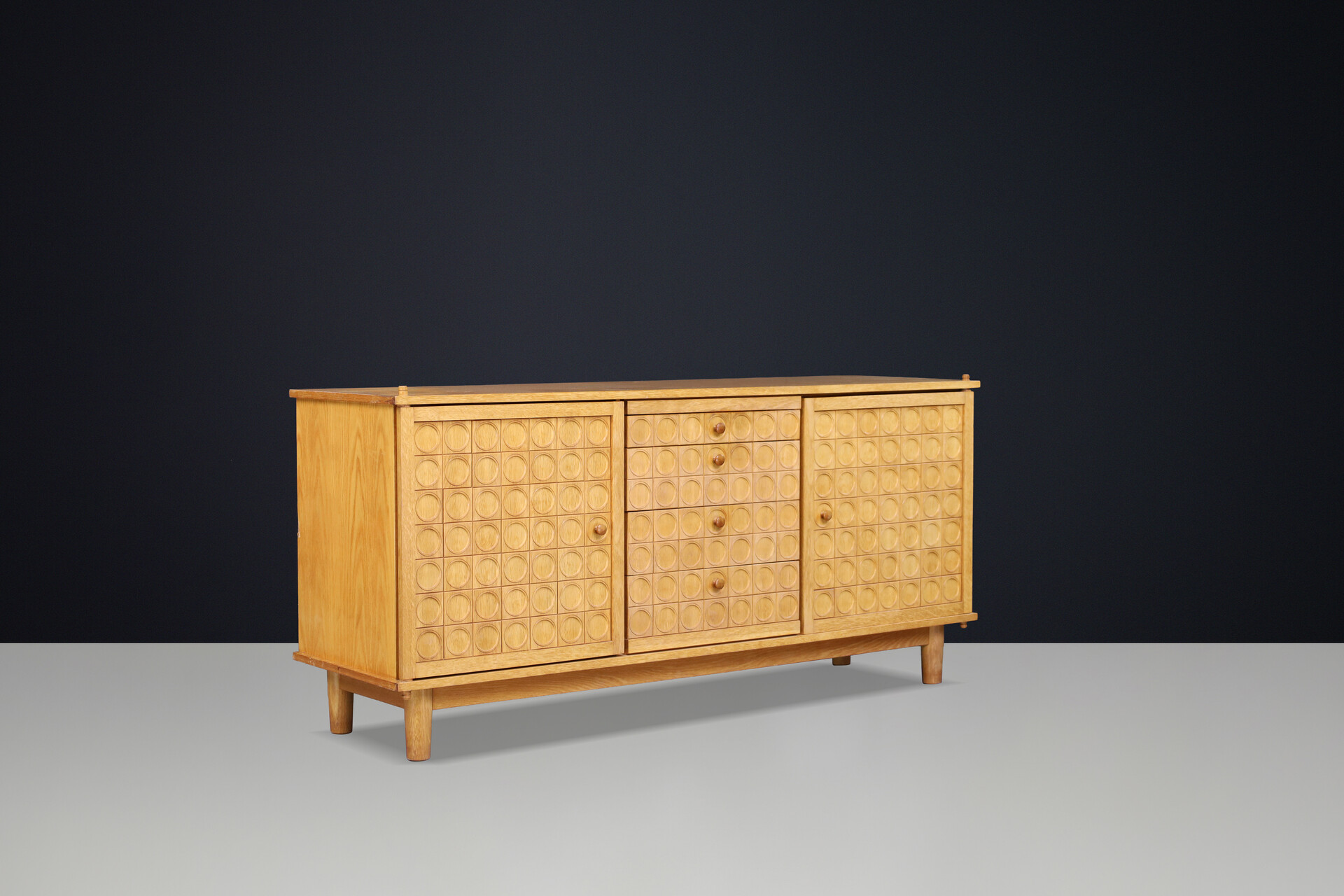 Belgian Brutalist Oak Sideboard with Graphic Circular Relief Doors, 1970s Late-20th century