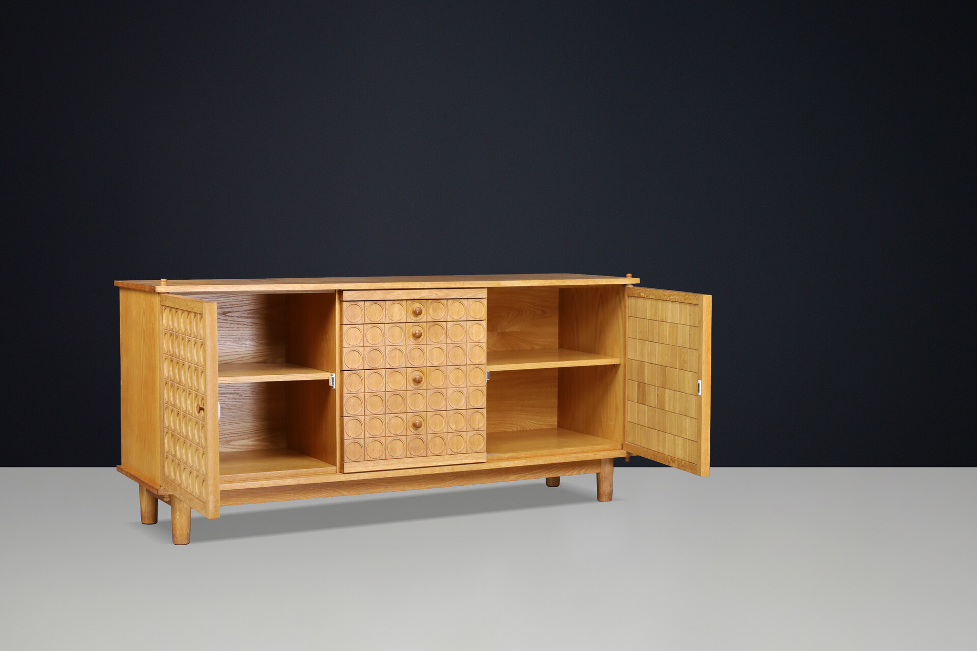 Belgian Brutalist Oak Sideboard with Graphic Circular Relief Doors, 1970s Late-20th century