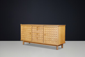 Belgian Brutalist Oak Sideboard with Graphic Circular Relief Doors, 1970s Late-20th century