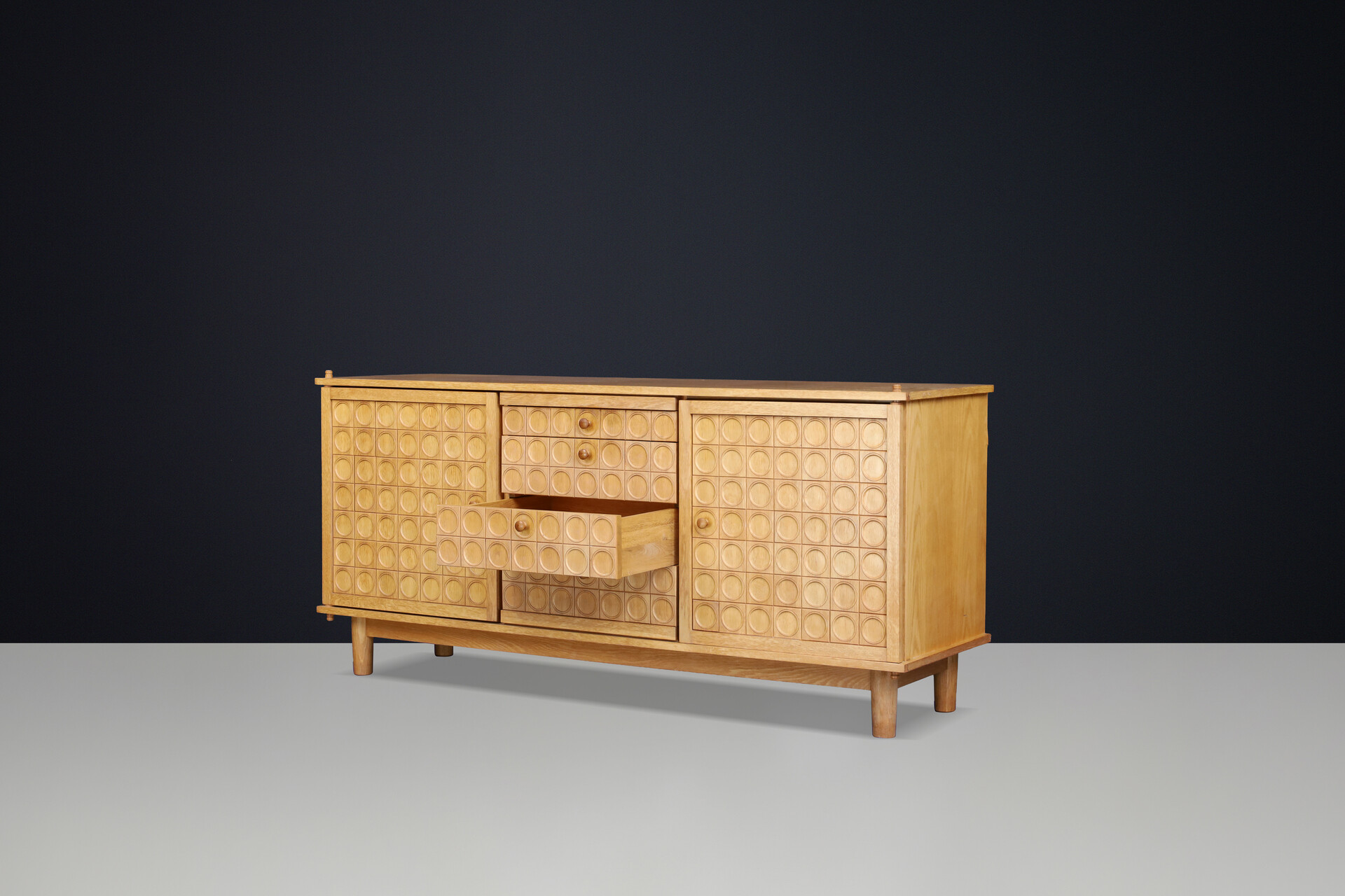 Belgian Brutalist Oak Sideboard with Graphic Circular Relief Doors, 1970s Late-20th century