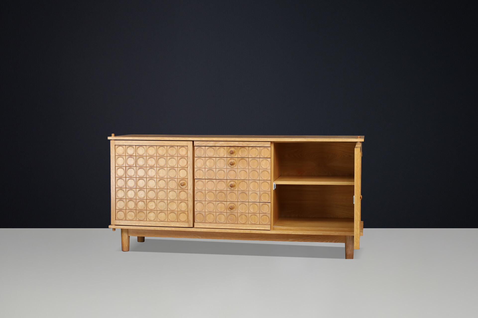 Belgian Brutalist Oak Sideboard with Graphic Circular Relief Doors, 1970s Late-20th century
