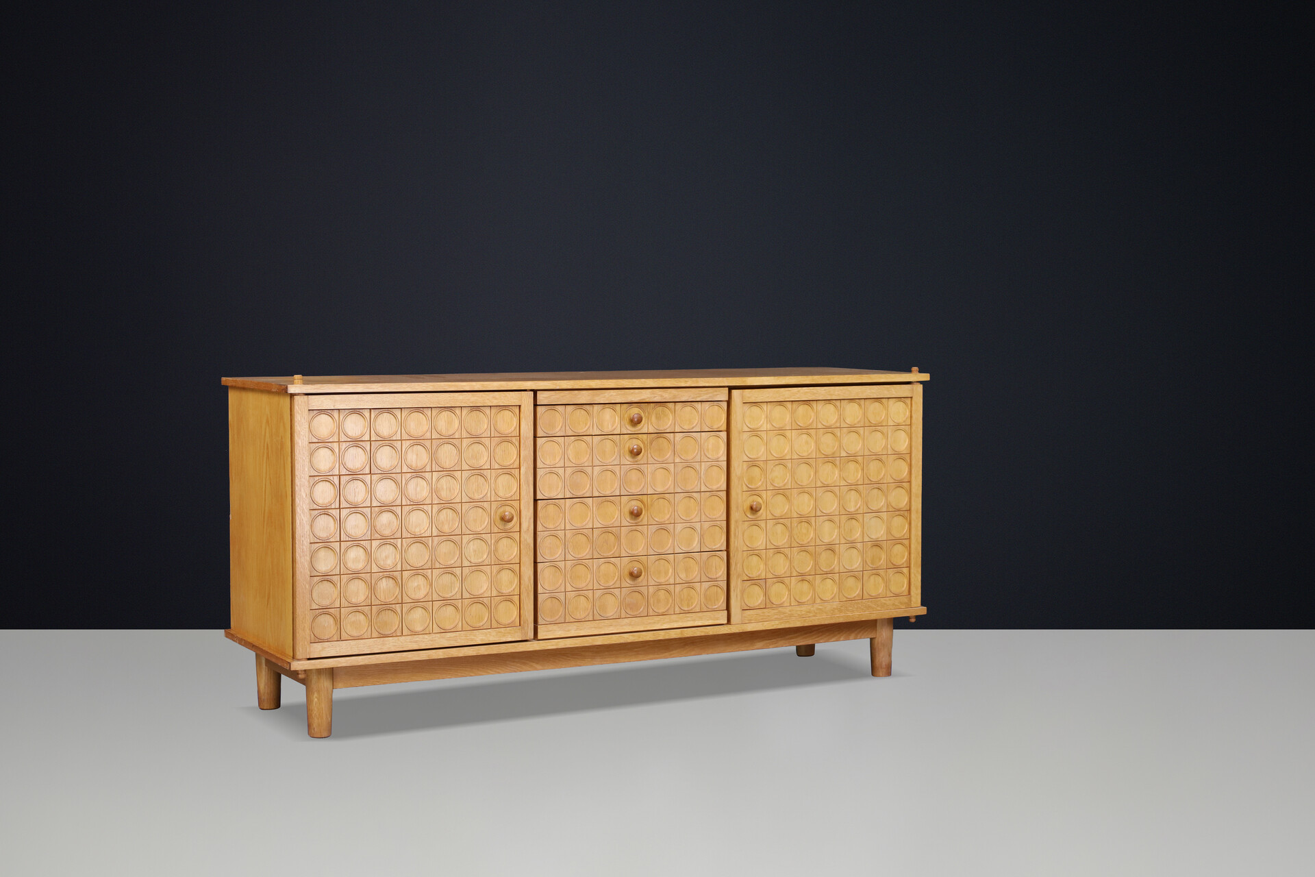 Belgian Brutalist Oak Sideboard with Graphic Circular Relief Doors, 1970s Late-20th century