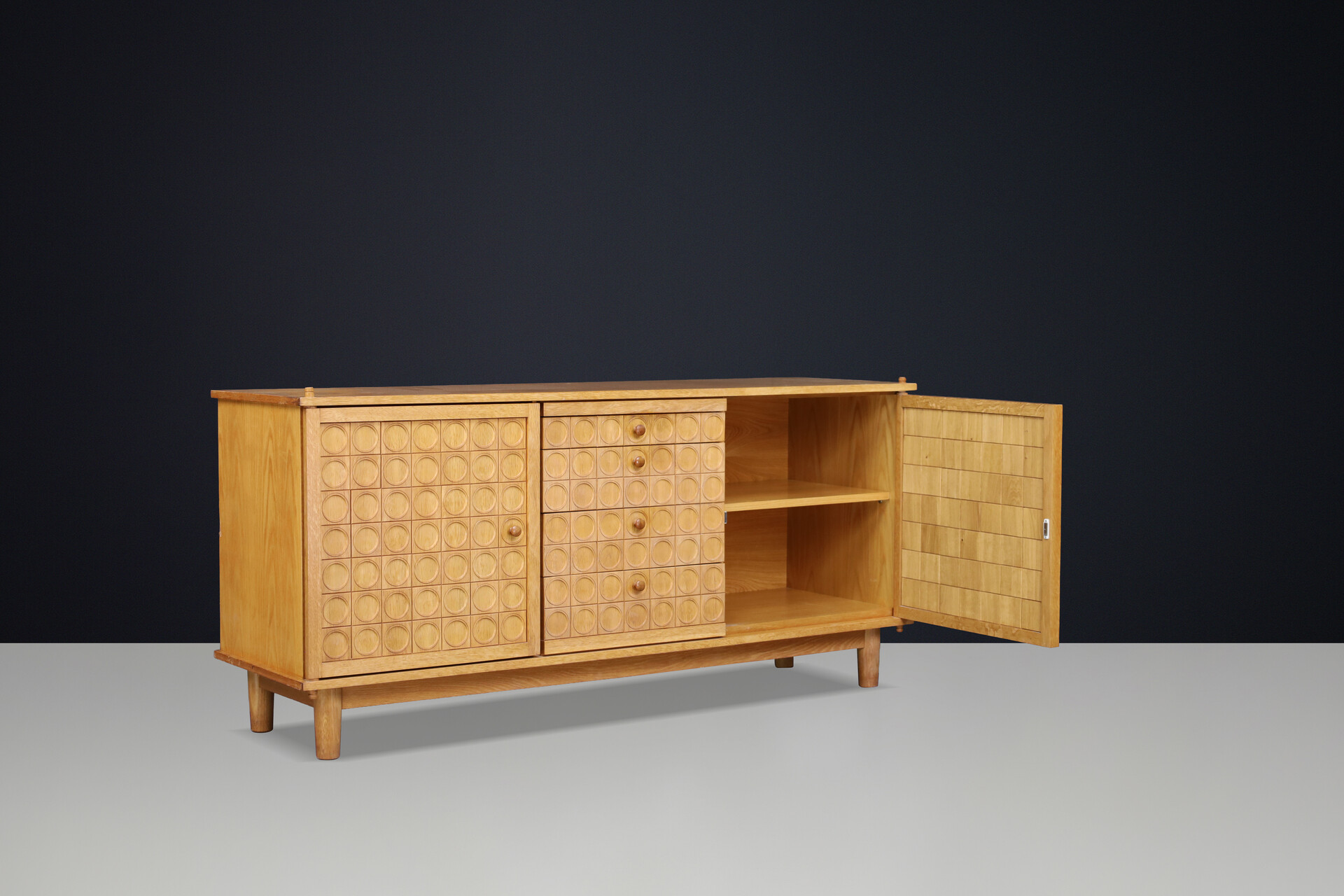 Belgian Brutalist Oak Sideboard with Graphic Circular Relief Doors, 1970s Late-20th century