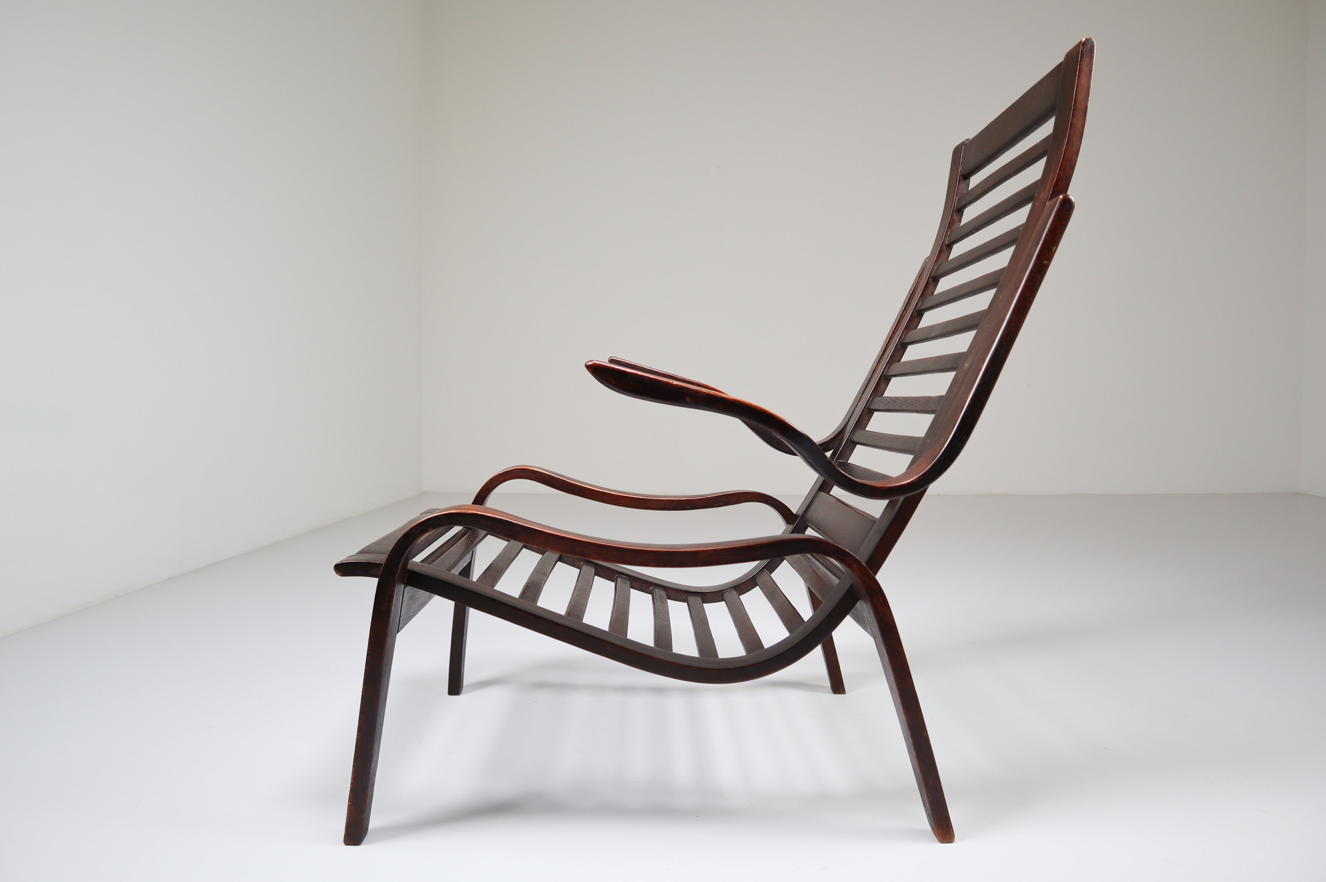 Bentwood Patinated lounge chairs in bentwood  Jan Vanek, Czech Republic, 1950s. Mid-20th century