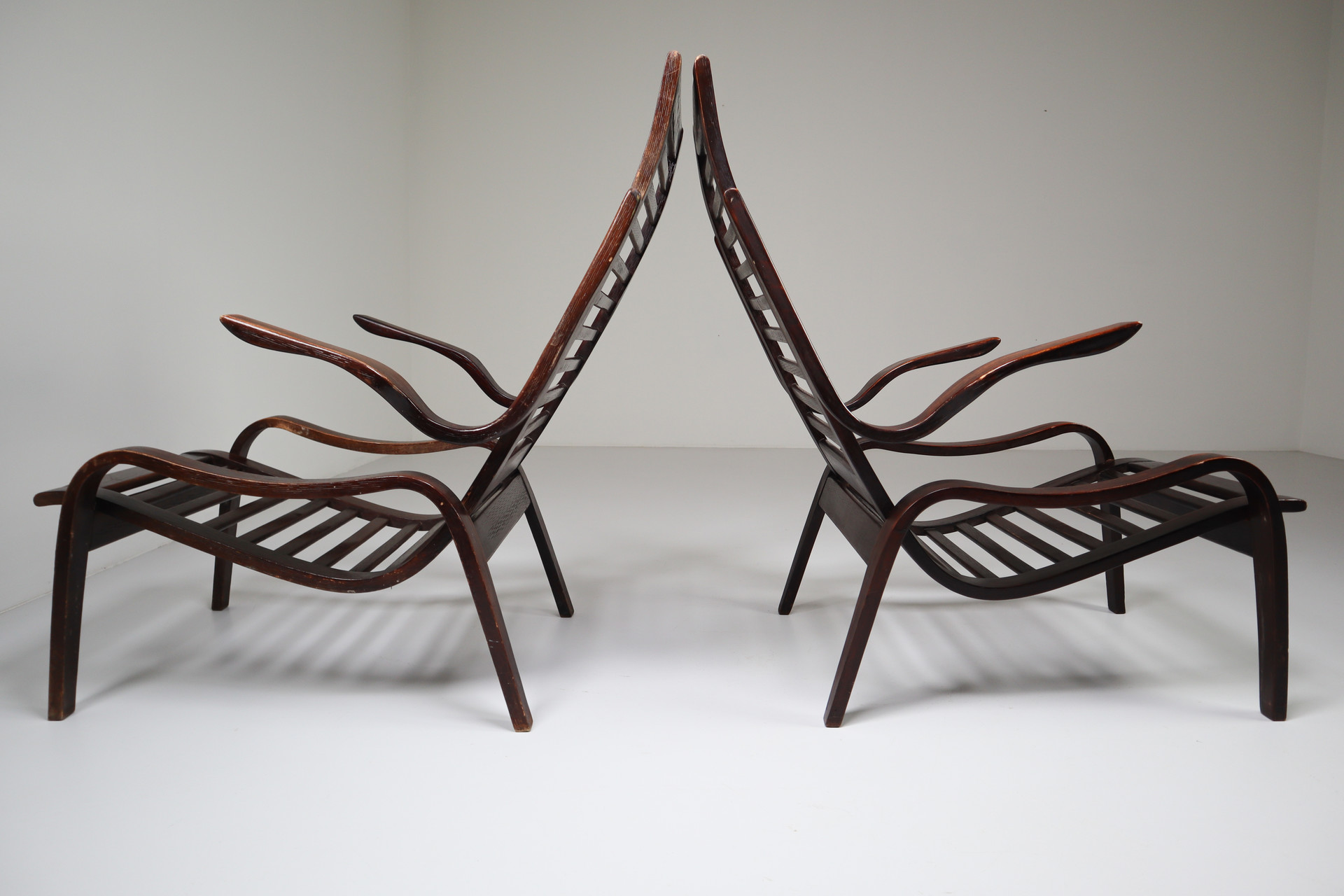 Bentwood Patinated lounge chairs in bentwood  Jan Vanek, Czech Republic, 1950s. Mid-20th century