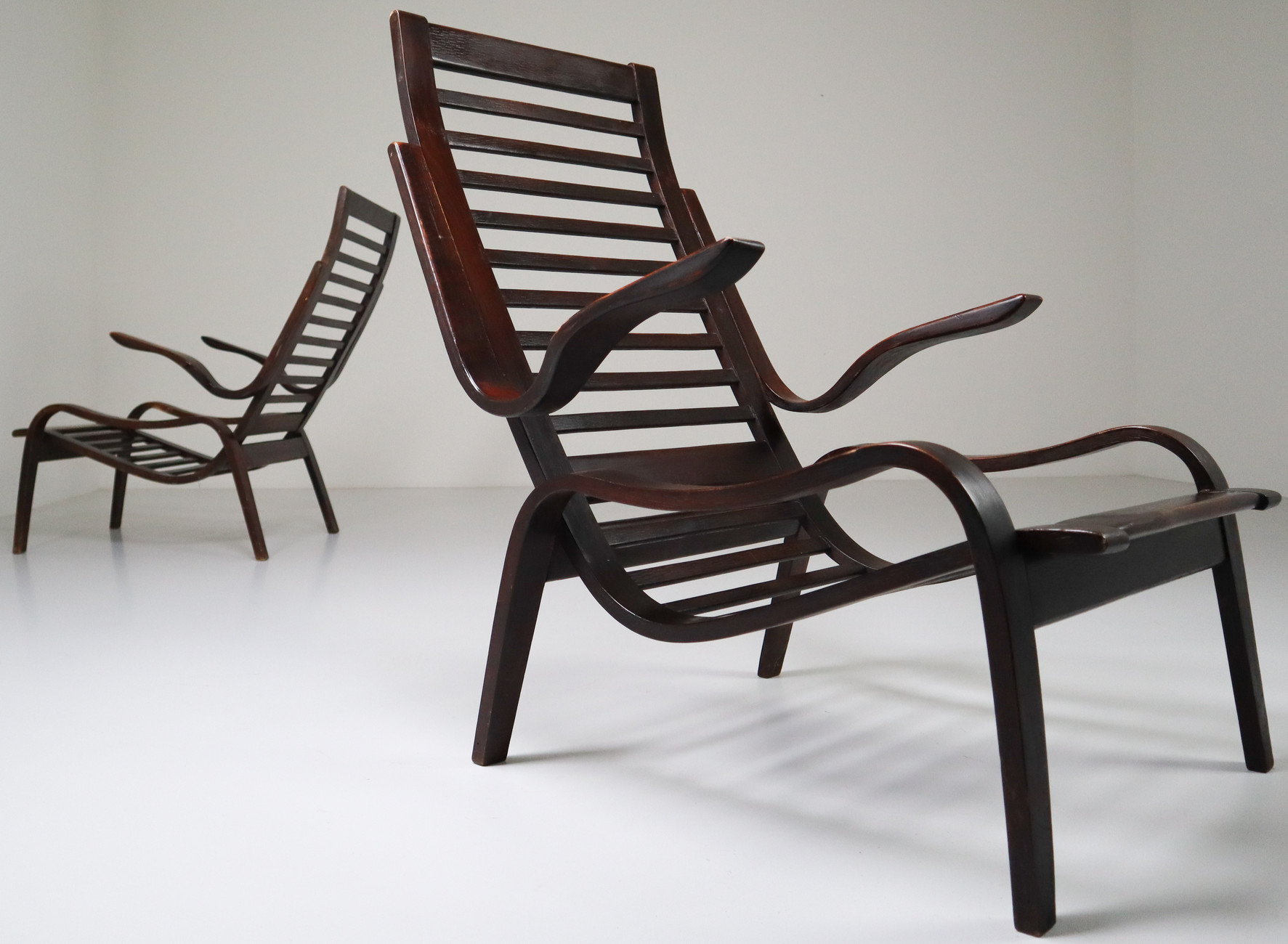 Bentwood Patinated lounge chairs in bentwood  Jan Vanek, Czech Republic, 1950s. Mid-20th century