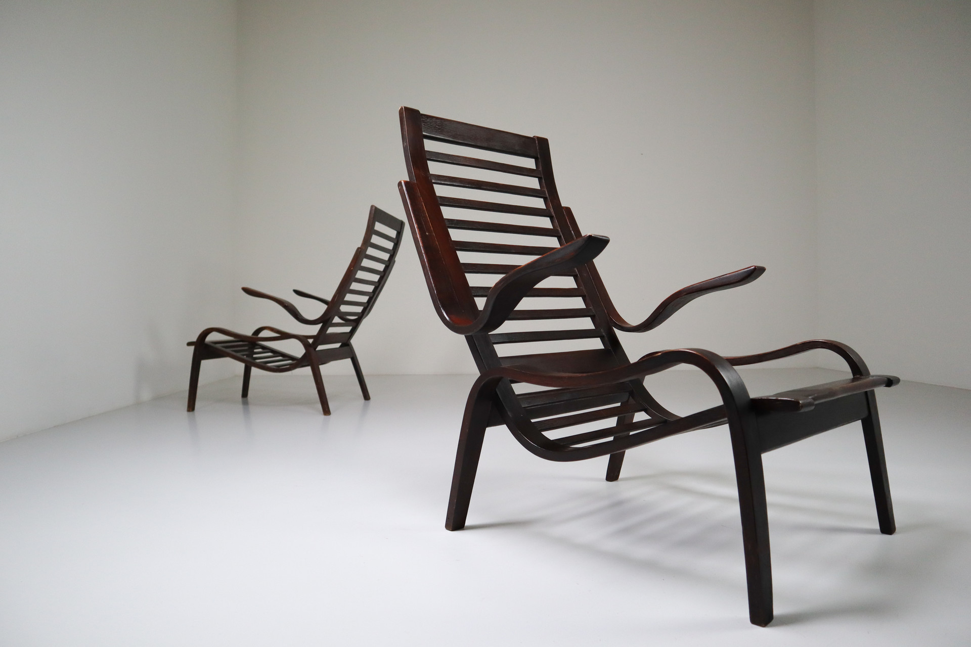 Bentwood Patinated lounge chairs in bentwood  Jan Vanek, Czech Republic, 1950s. Mid-20th century