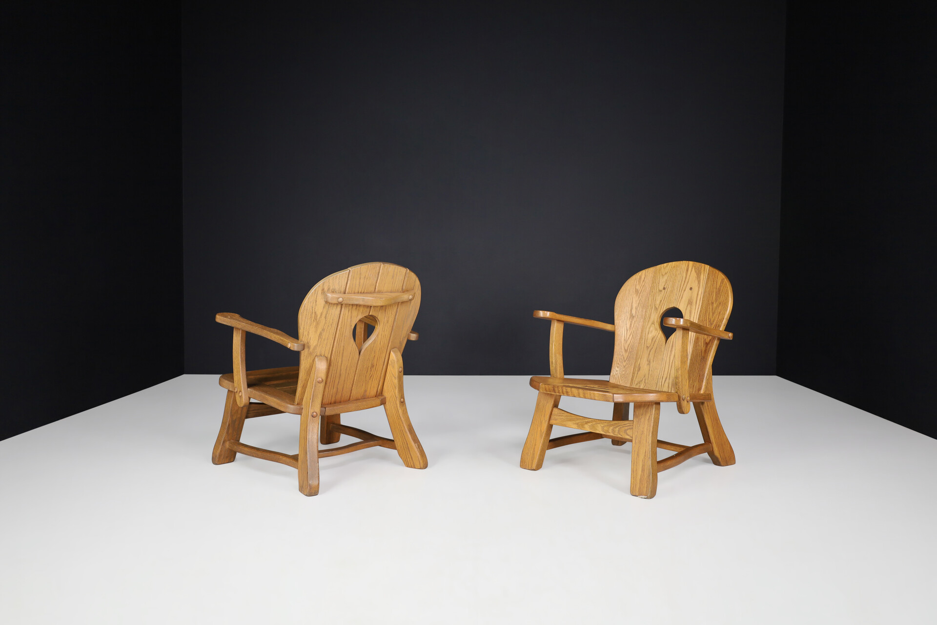 Brutalist Oak lounge chairs in solid oak, France 1960s Mid-20th century