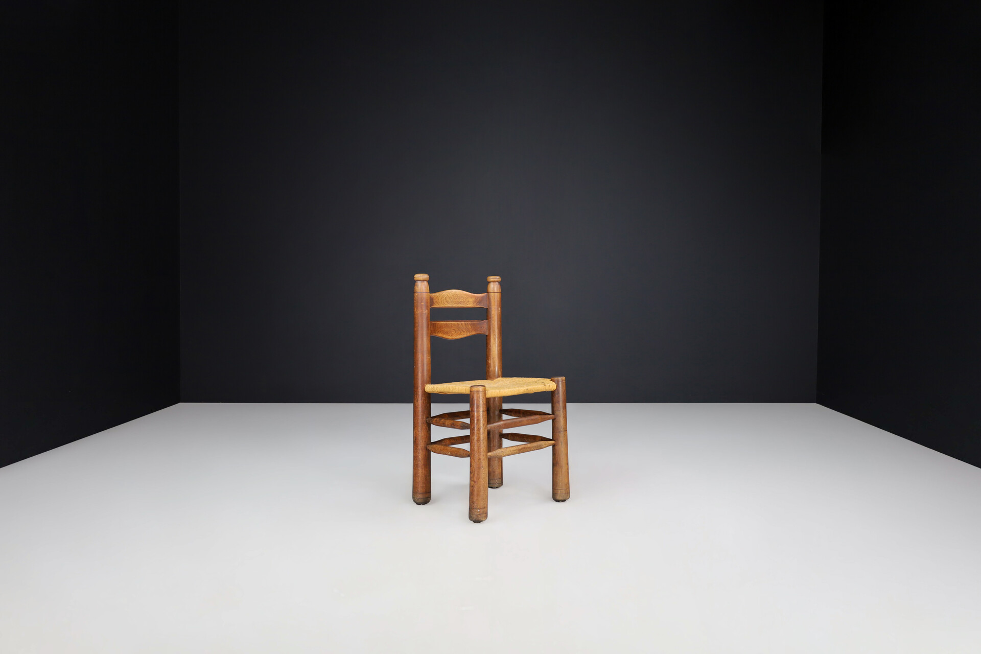 Brutalist Patinated Oak and Rush dining ( Charles Dudouyt style ), France, 1940s Mid-20th century