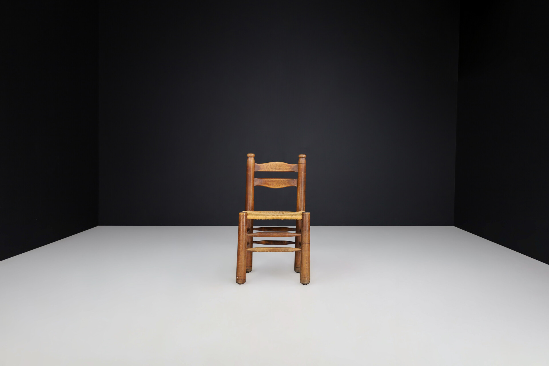 Brutalist Patinated Oak and Rush dining ( Charles Dudouyt style ), France, 1940s Mid-20th century