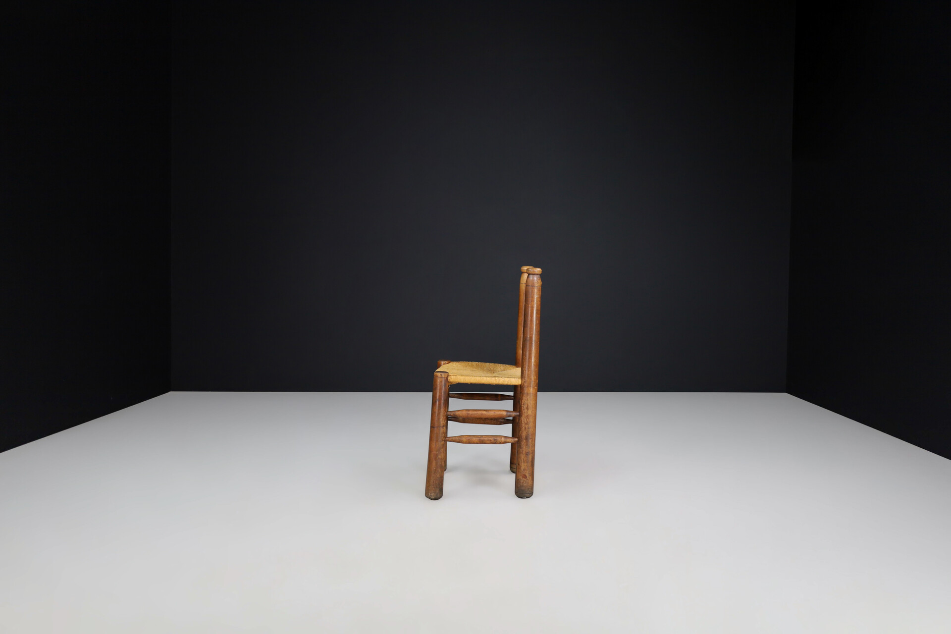 Brutalist Patinated Oak and Rush dining ( Charles Dudouyt style ), France, 1940s Mid-20th century
