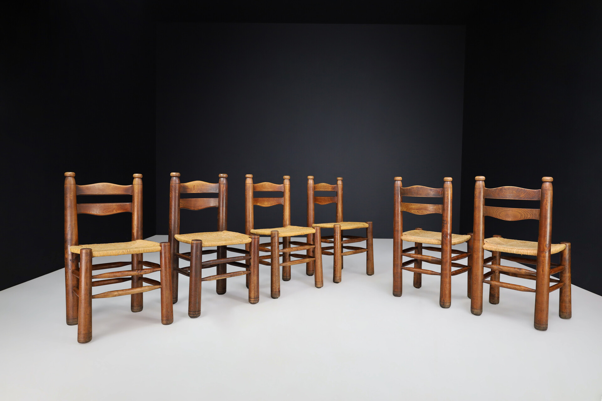 Brutalist Patinated Oak and Rush dining ( Charles Dudouyt style ), France, 1940s Mid-20th century