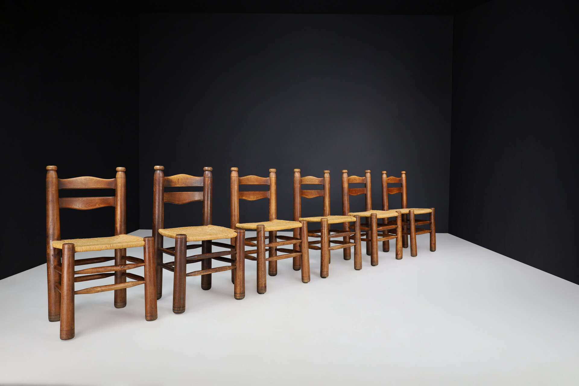 Brutalist Patinated Oak and Rush dining ( Charles Dudouyt style ), France, 1940s Mid-20th century