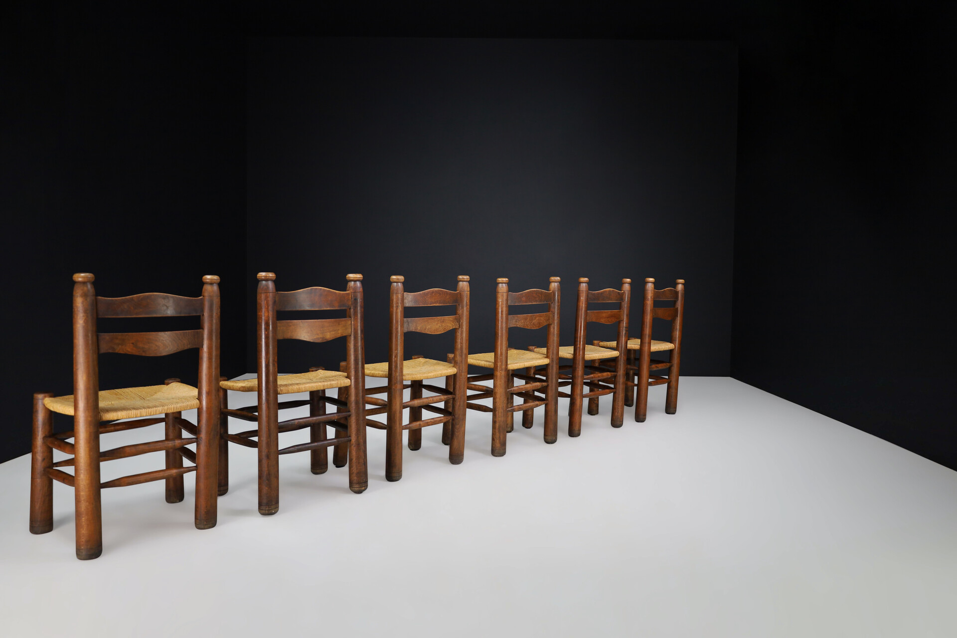 Brutalist Patinated Oak and Rush dining ( Charles Dudouyt style ), France, 1940s Mid-20th century
