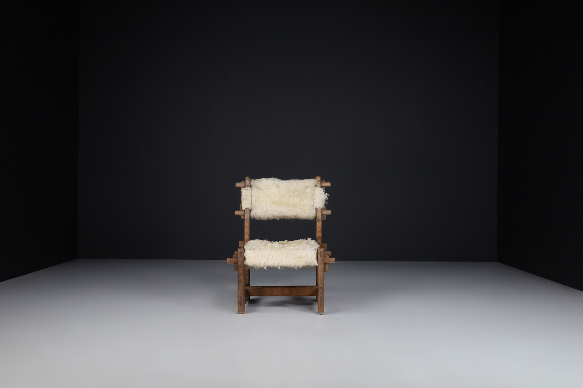 Brutalist Primitive oak side chair with lamswool fur , France 1950s Mid-20th century