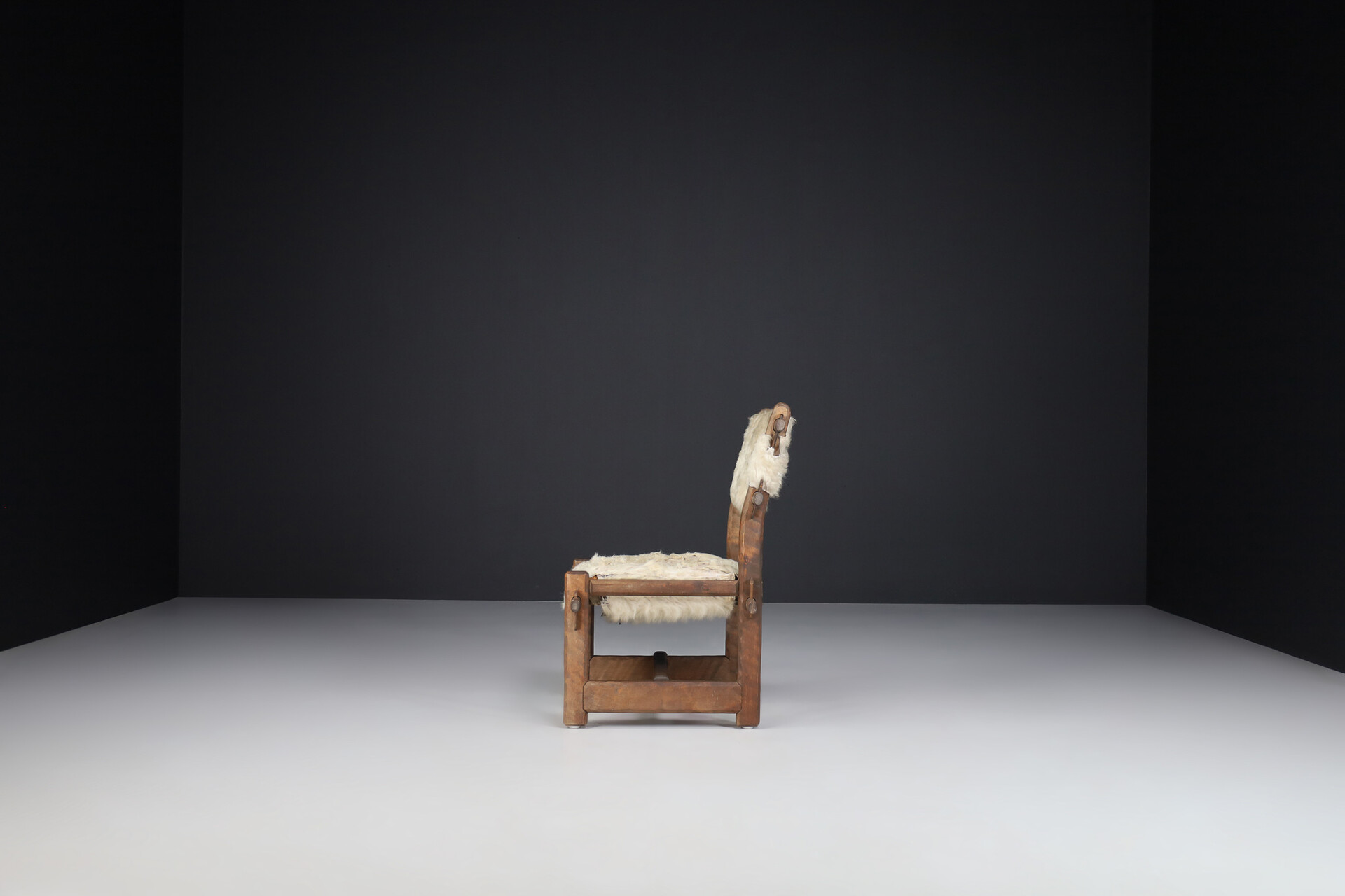 Brutalist Primitive oak side chair with lamswool fur , France 1950s Mid-20th century