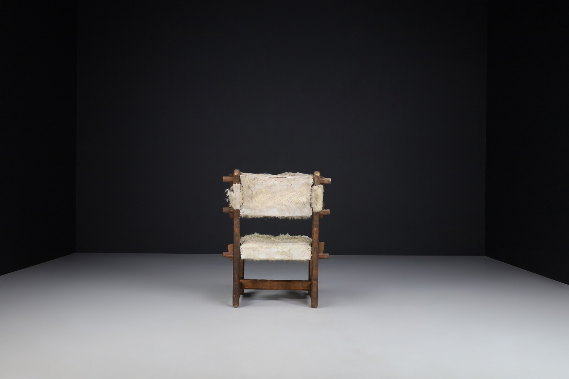 Brutalist Primitive oak side chair with lamswool fur , France 1950s Mid-20th century