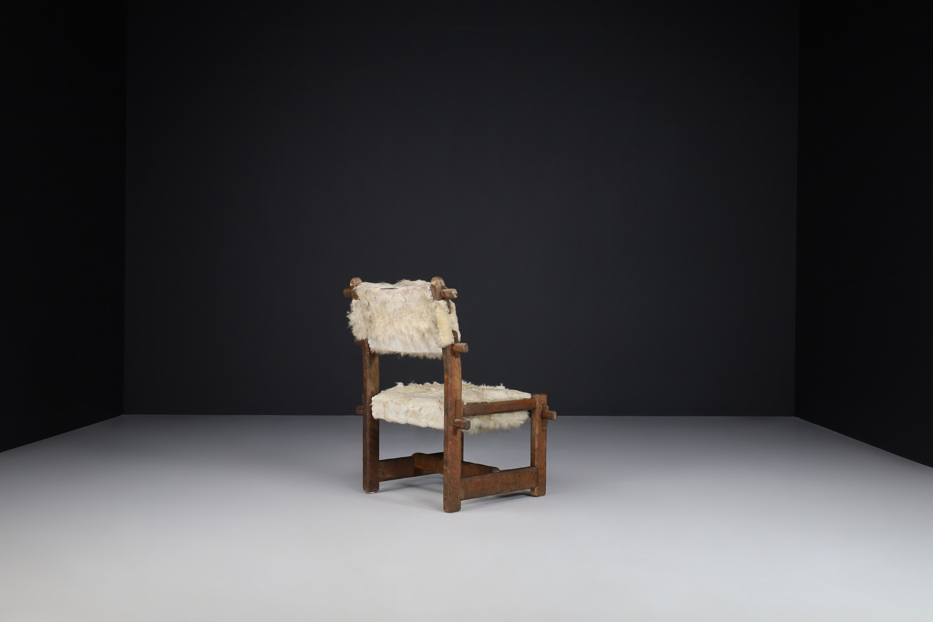 Brutalist Primitive oak side chair with lamswool fur , France 1950s Mid-20th century