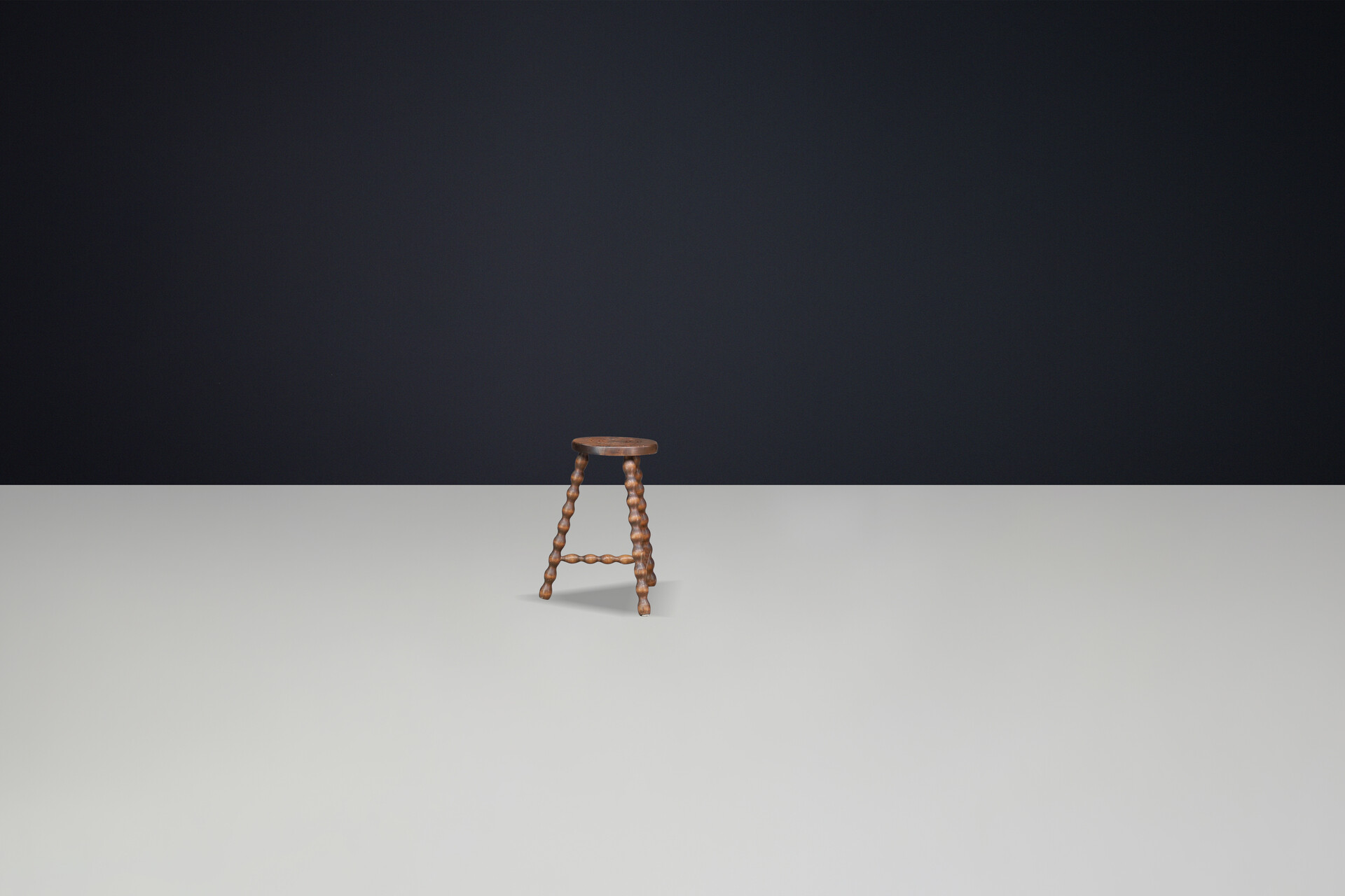 Brutalist Walnut stool with turned legs t-stretcher and incised seat design, in the style of Charles Duduoyt, France 1950's. Mid-20th century