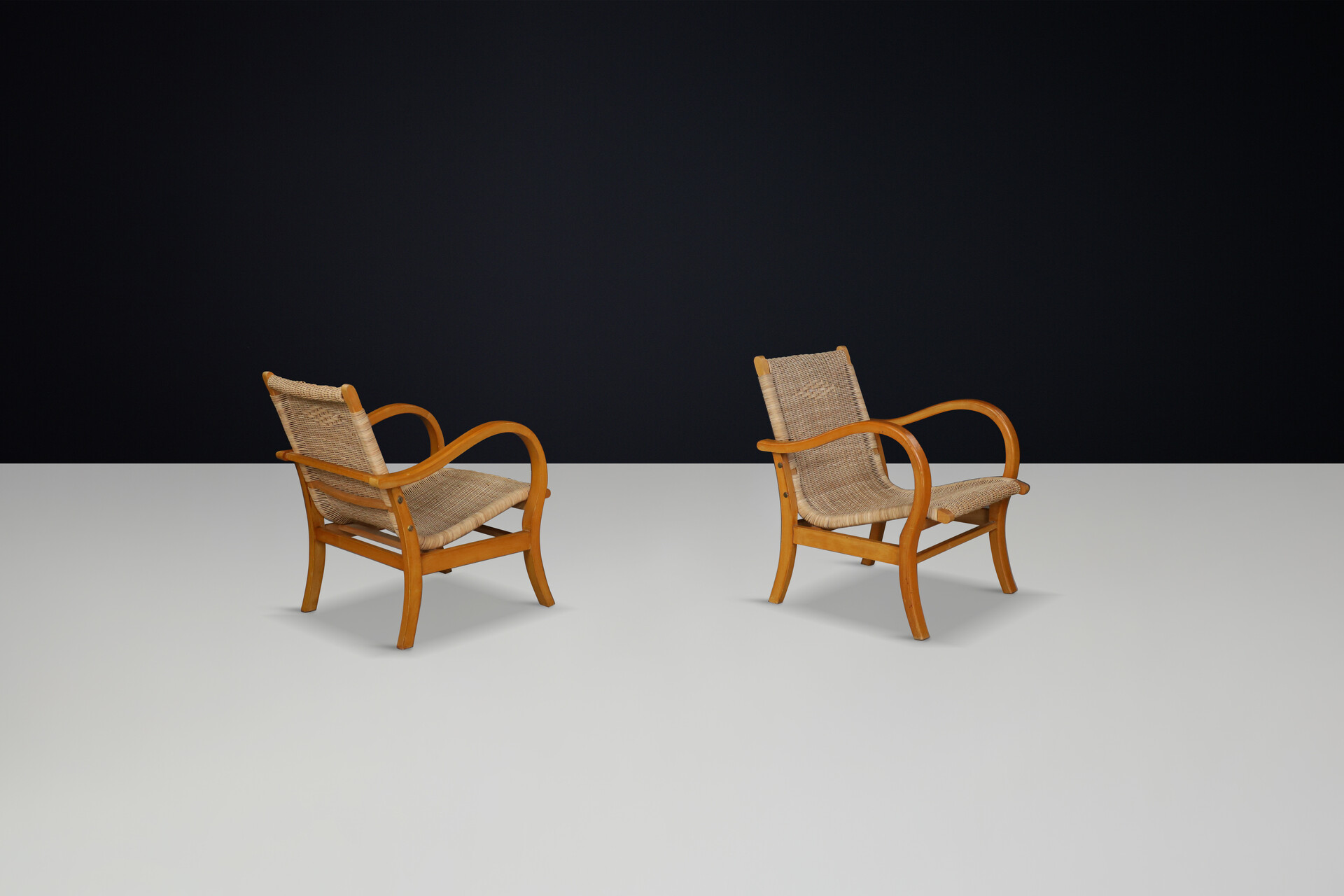 Cane seating and back arm chairs by Erich Dieckman, Germany 1950s Mid-20th century