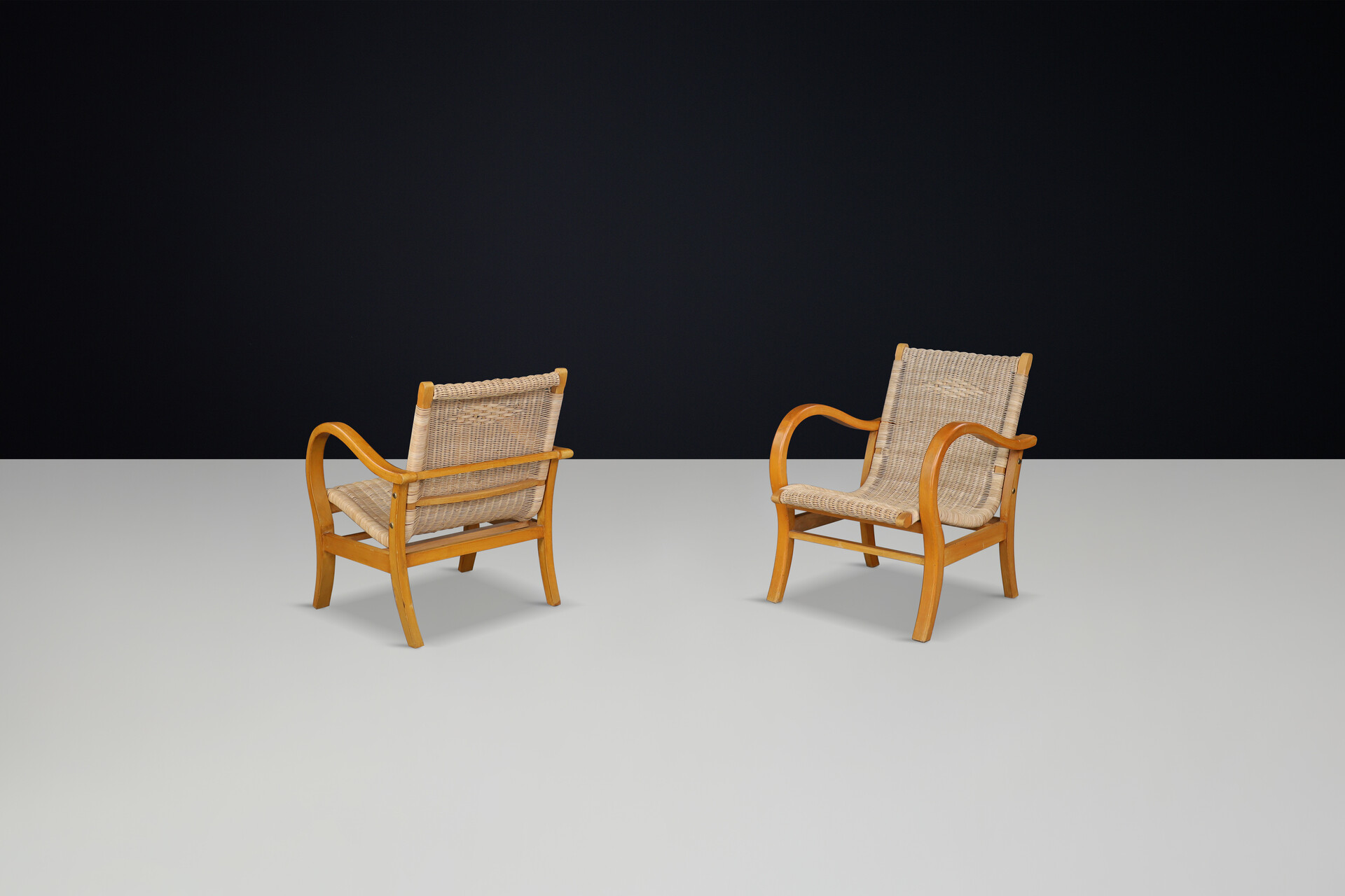 Cane seating and back arm chairs by Erich Dieckman, Germany 1950s Mid-20th century