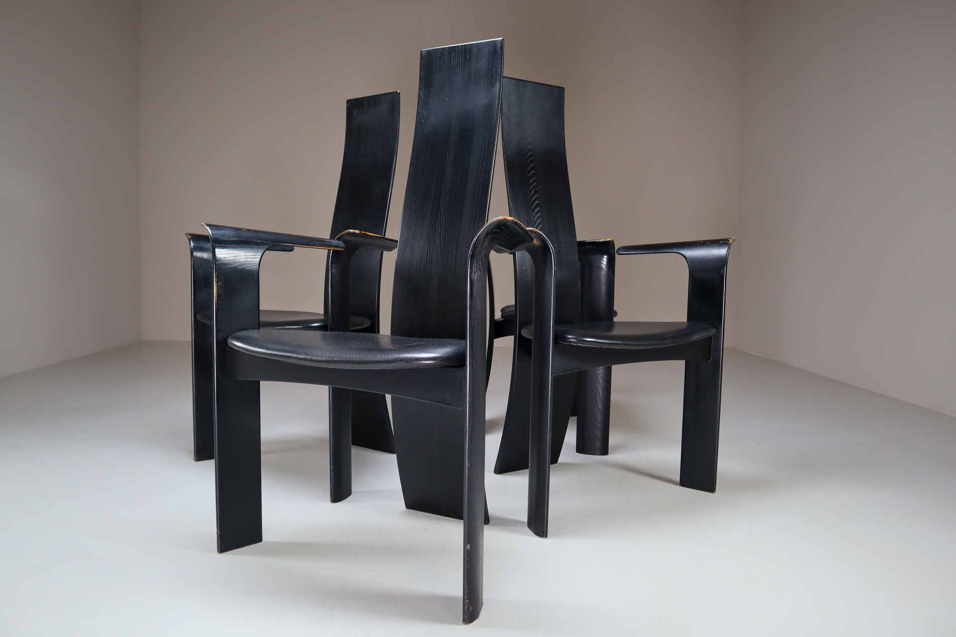 Danish Ebonized Highback Arm Chairs by Bob og Dries Van Den Bergh for Tranekær Mobler. Mid-20th century
