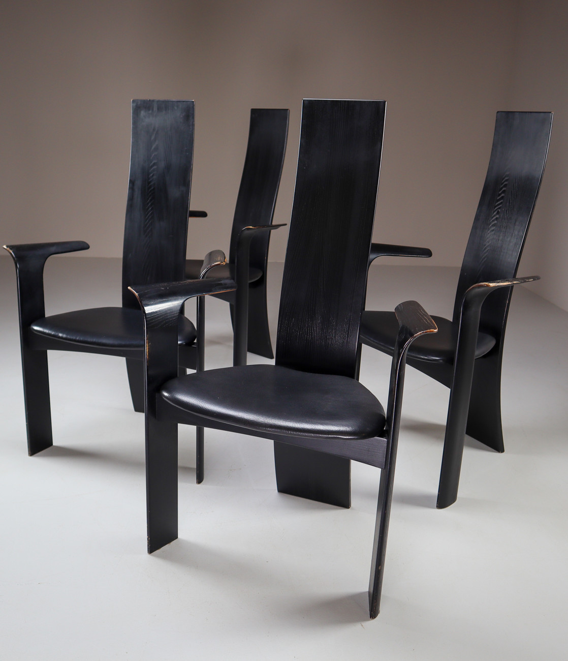 Danish Ebonized Highback Arm Chairs by Bob og Dries Van Den Bergh for Tranekær Mobler. Mid-20th century