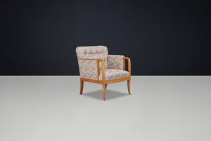 Elegant 1930s French Art Deco Oak Armchair with Original Floral Upholstery. Early-20th century
