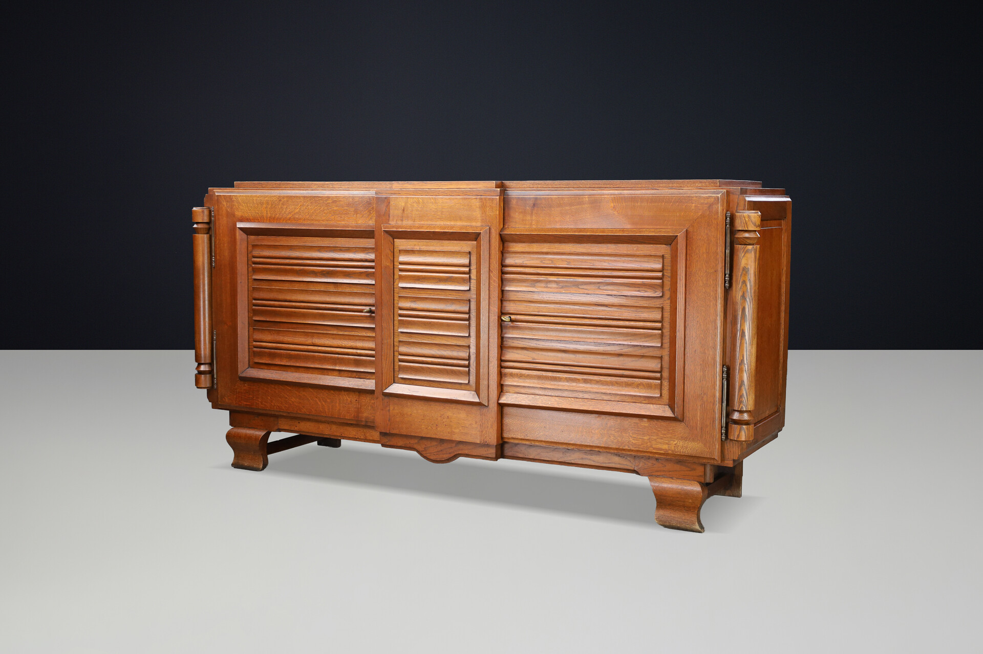 French Art Deco Patinated Oak Sideboard with Relief Carved Doors, 1940s Early-20th century