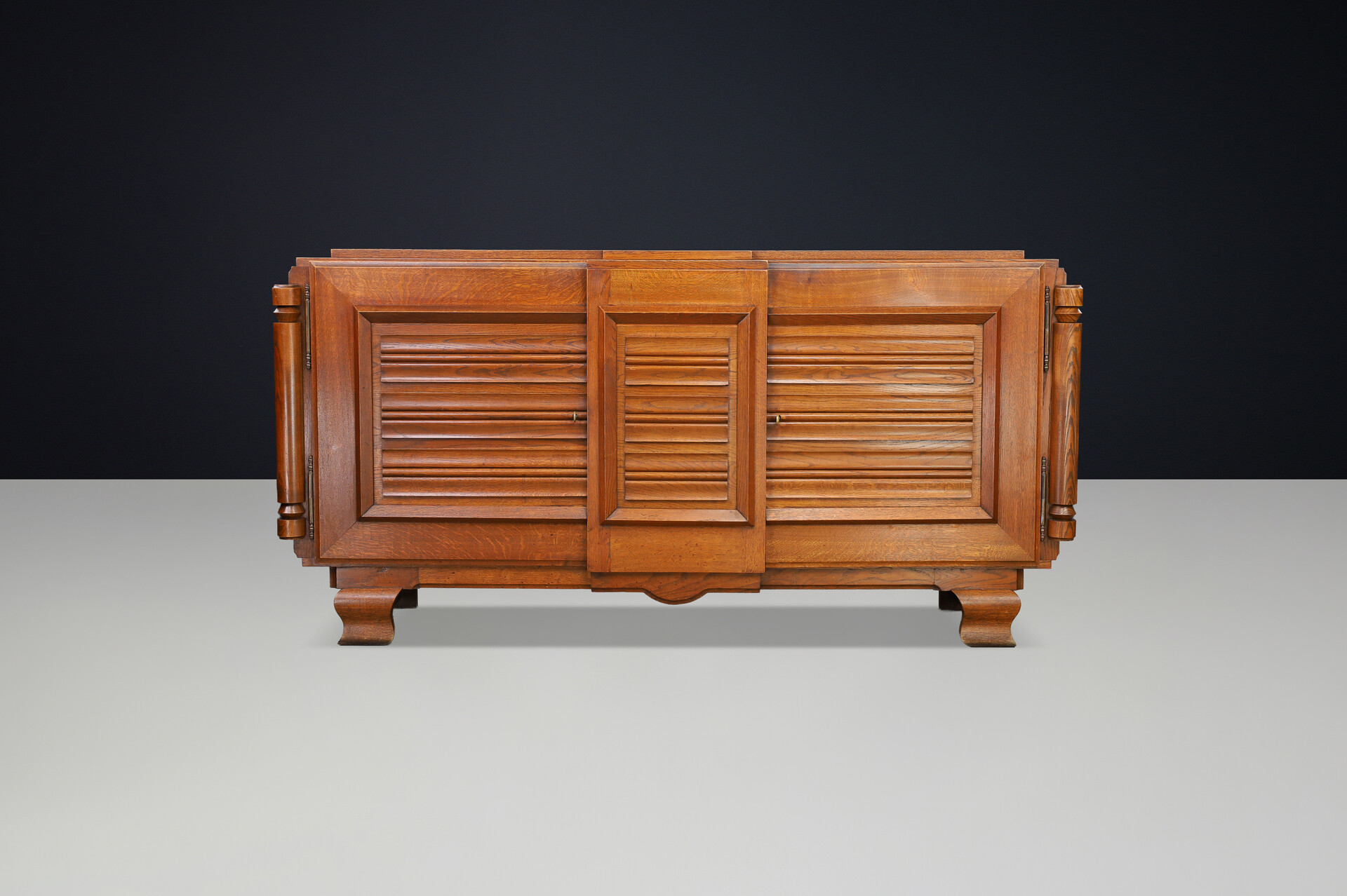 French Art Deco Patinated Oak Sideboard with Relief Carved Doors, 1940s Early-20th century