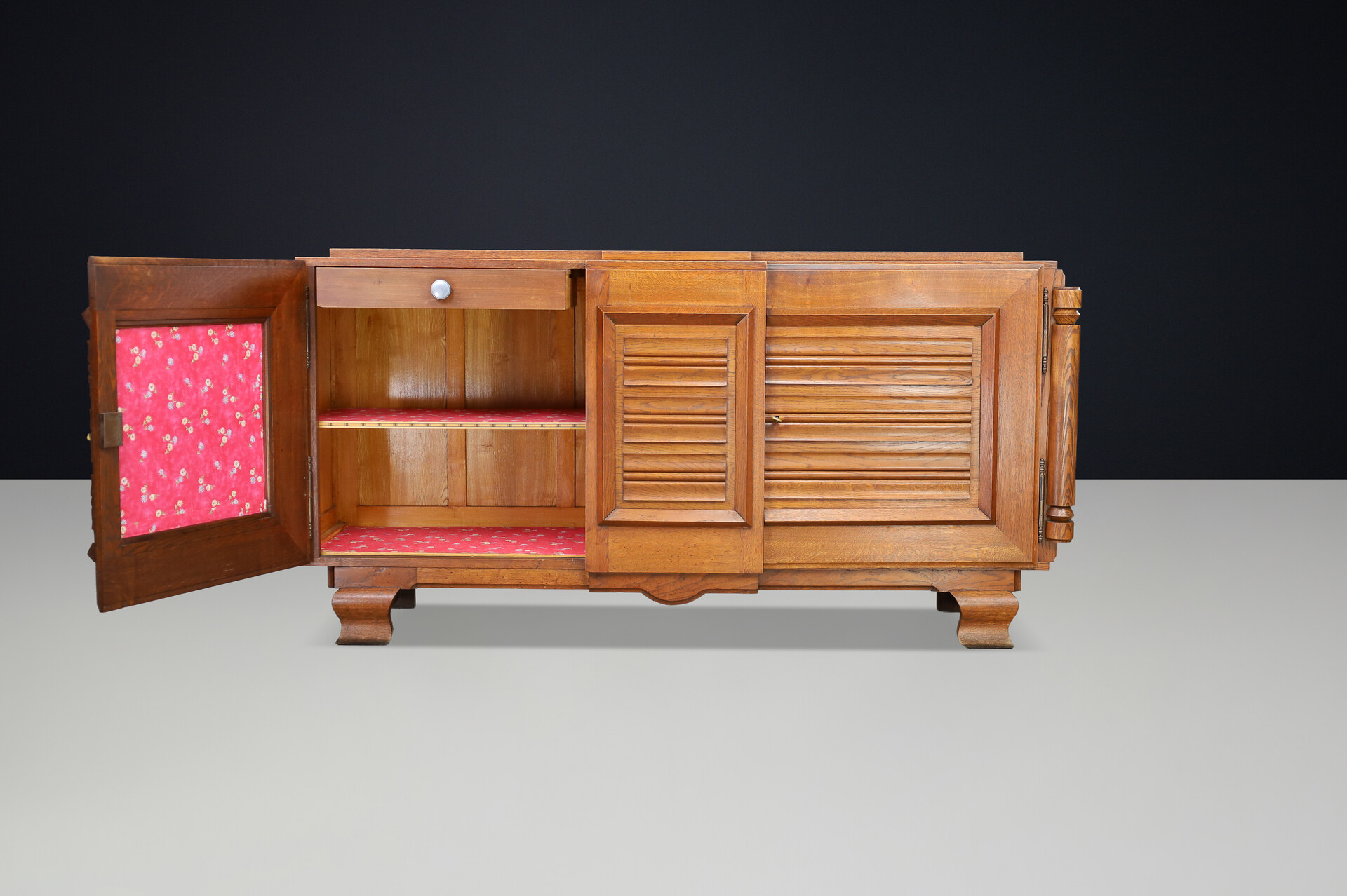 French Art Deco Patinated Oak Sideboard with Relief Carved Doors, 1940s Early-20th century