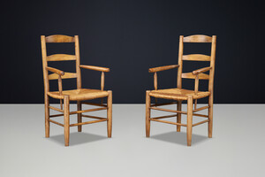 French Oak Armchairs with Rush Seats in the Style of Charlotte Perriand, France 1950s Mid-20th century