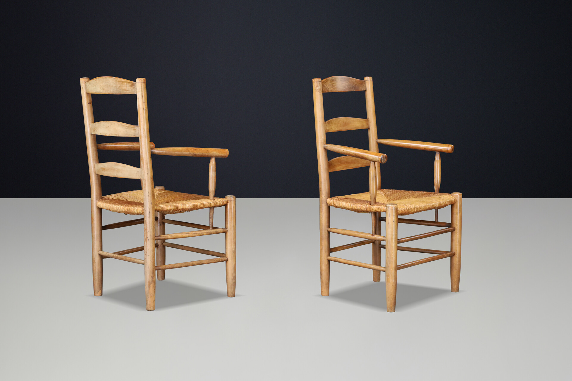 French Oak Armchairs with Rush Seats in the Style of Charlotte Perriand, France 1950s Mid-20th century