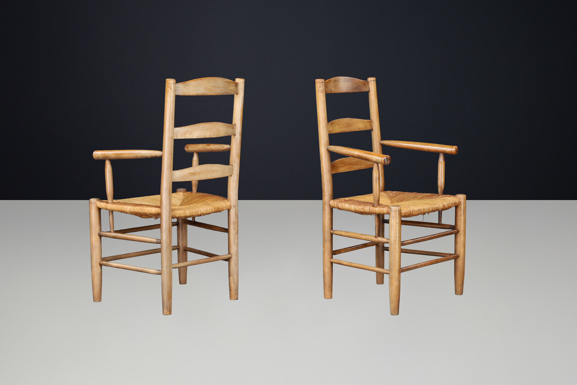 French Oak Armchairs with Rush Seats in the Style of Charlotte Perriand, France 1950s Mid-20th century