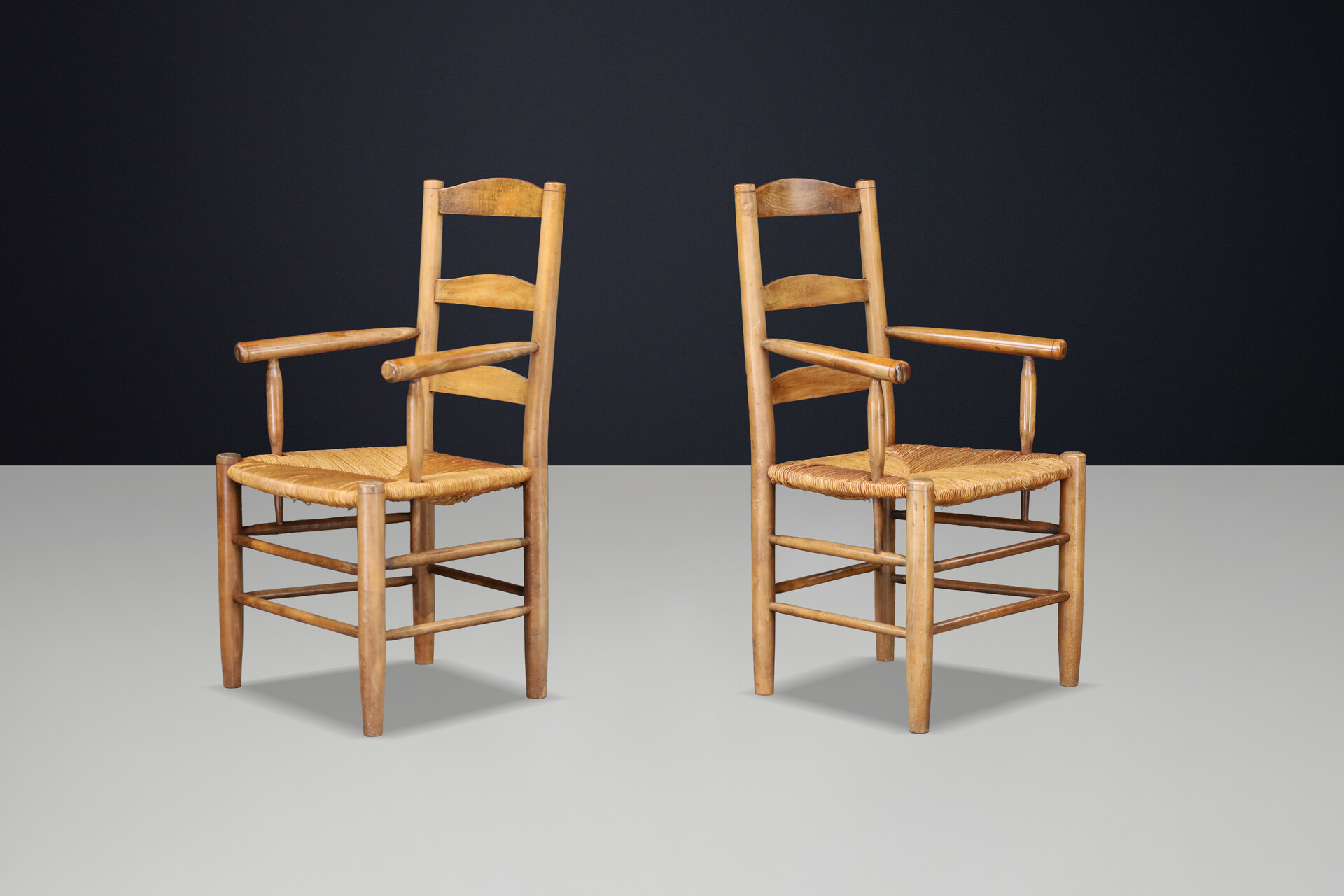 French Oak Armchairs with Rush Seats in the Style of Charlotte Perriand, France 1950s Mid-20th century