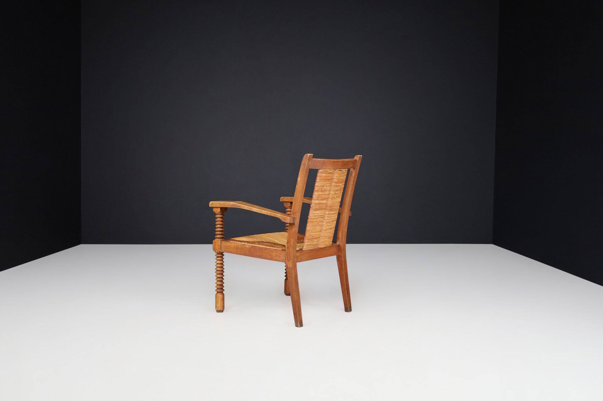 French provincial Charles Dudouyt Patinated Oak and Rush Armchairs, France 1940s Mid-20th century