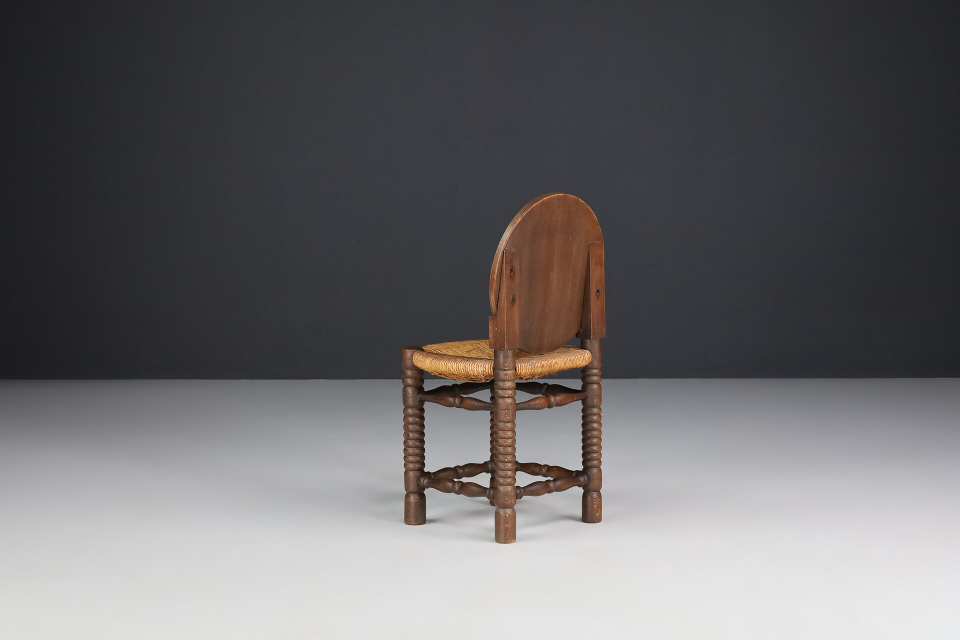 French provincial Oak and Rush Chair by Charles Duduouyt, France 1940s Mid-20th century