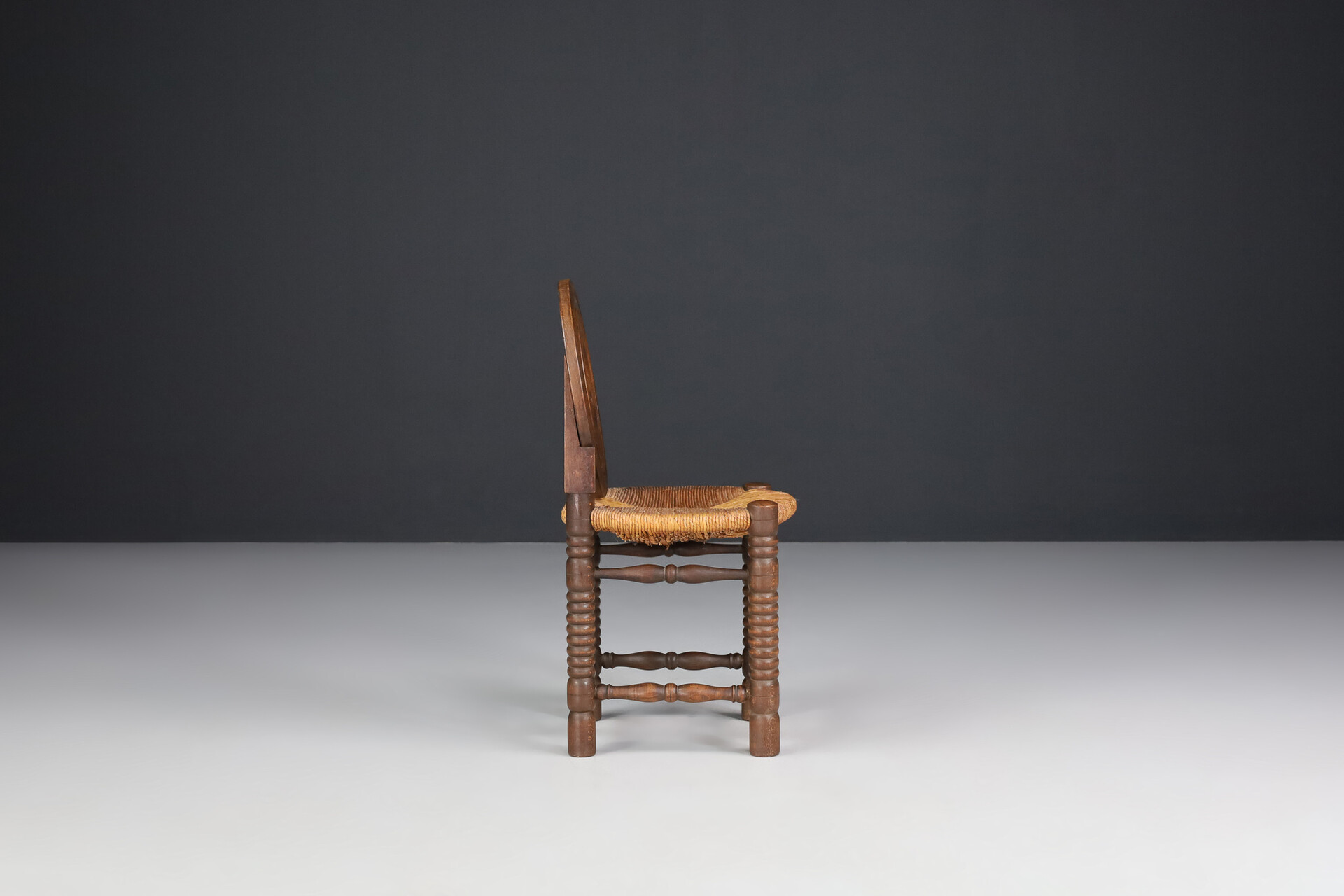 French provincial Oak and Rush Chair by Charles Duduouyt, France 1940s Mid-20th century